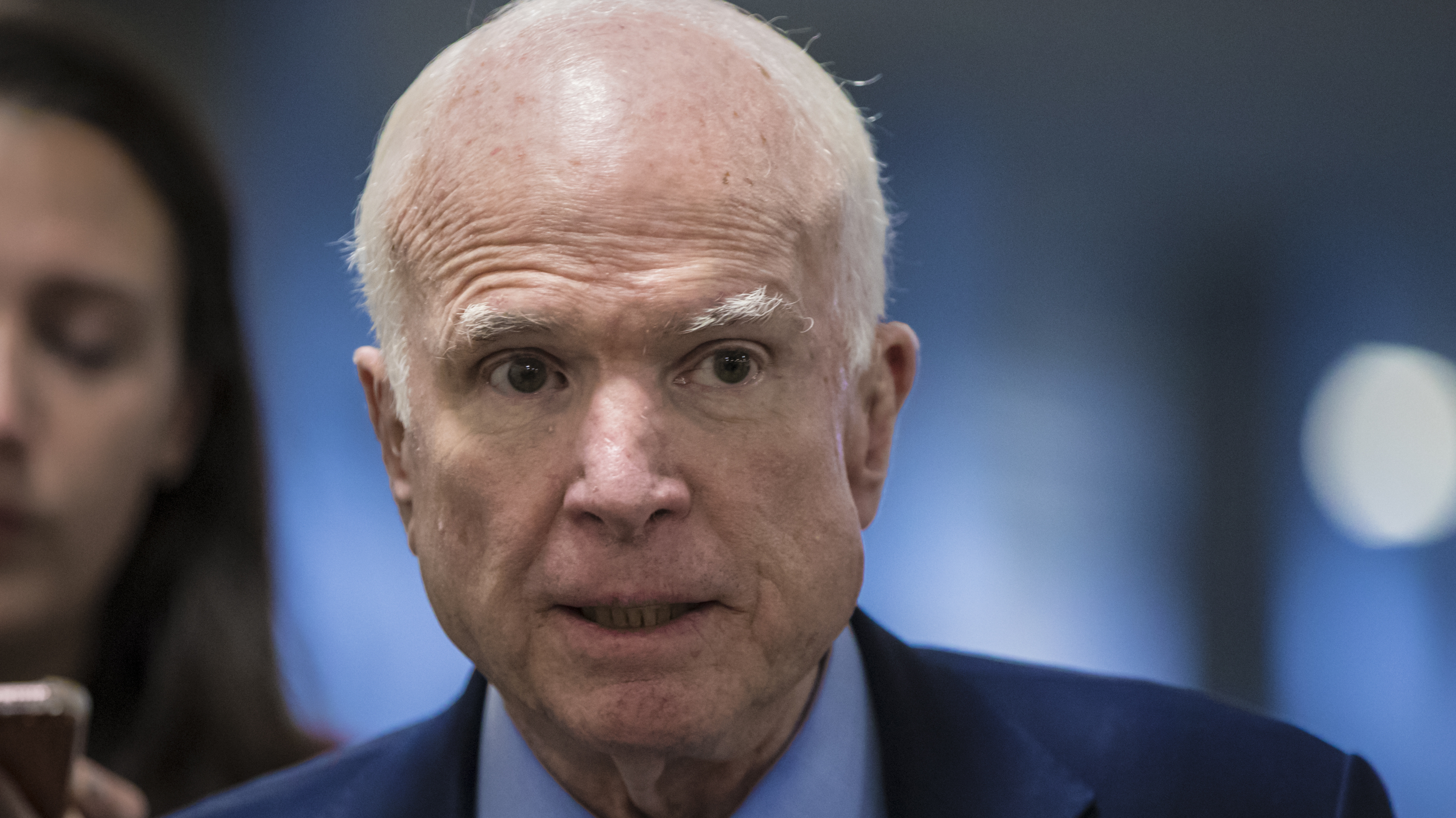 Sen John McCain, R-Ariz., returns to his office after a series of votes at the Capitol in Washington on Thursday.