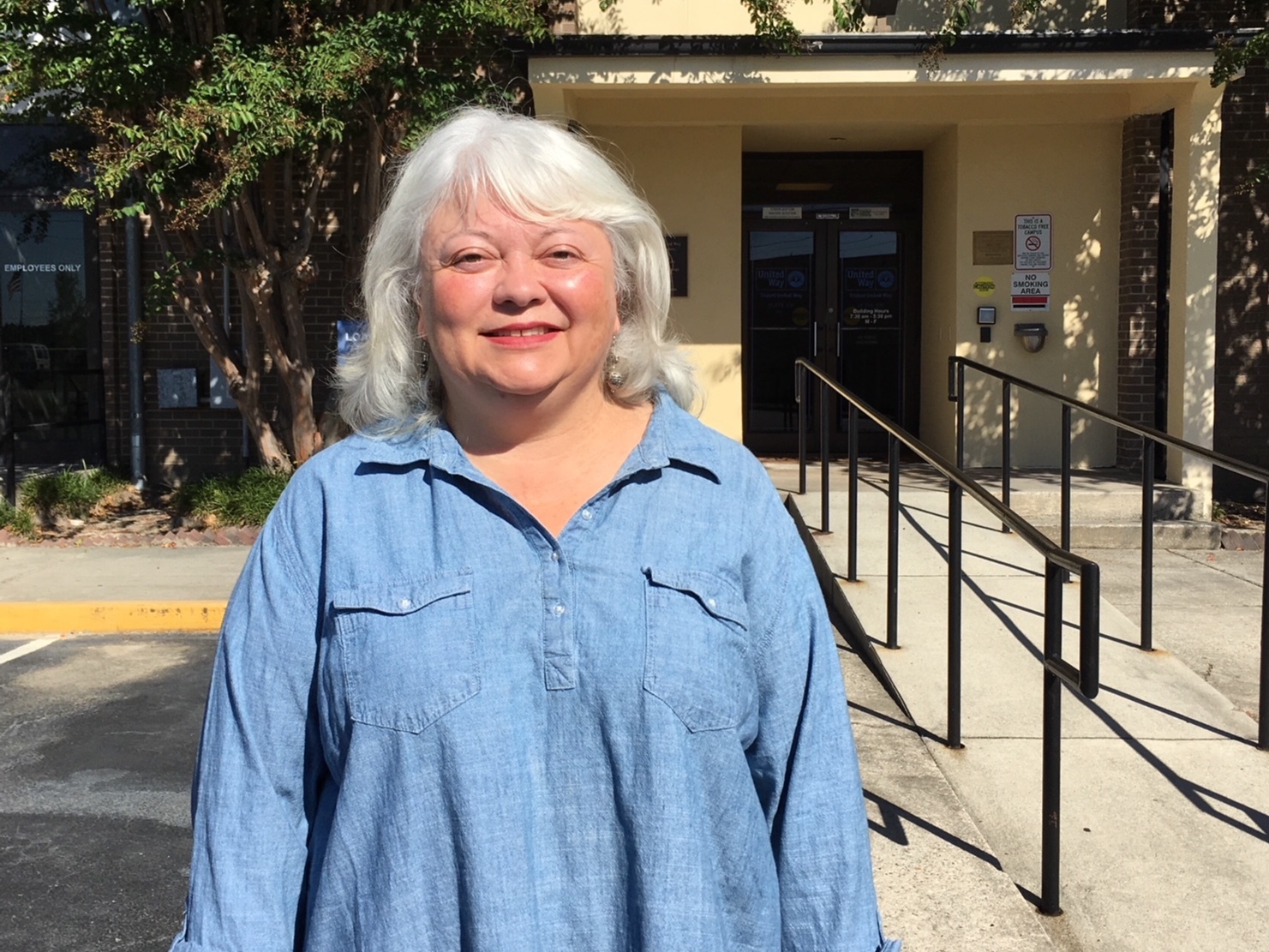 Nearly half of the federal funding has been cut for the navigator program that Shelli Quenga leads for South Carolina's Palmetto Project. (Alex Olgin/WFAE)