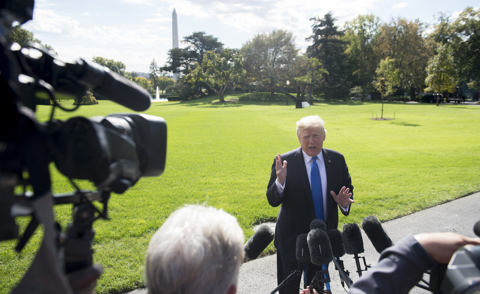 Speaking to the media prior to departing from the White House on Wednesday, President Trump repeated his theory that the Russia collusion story is a hoax. (Saul Loeb/AFP/Getty Images)