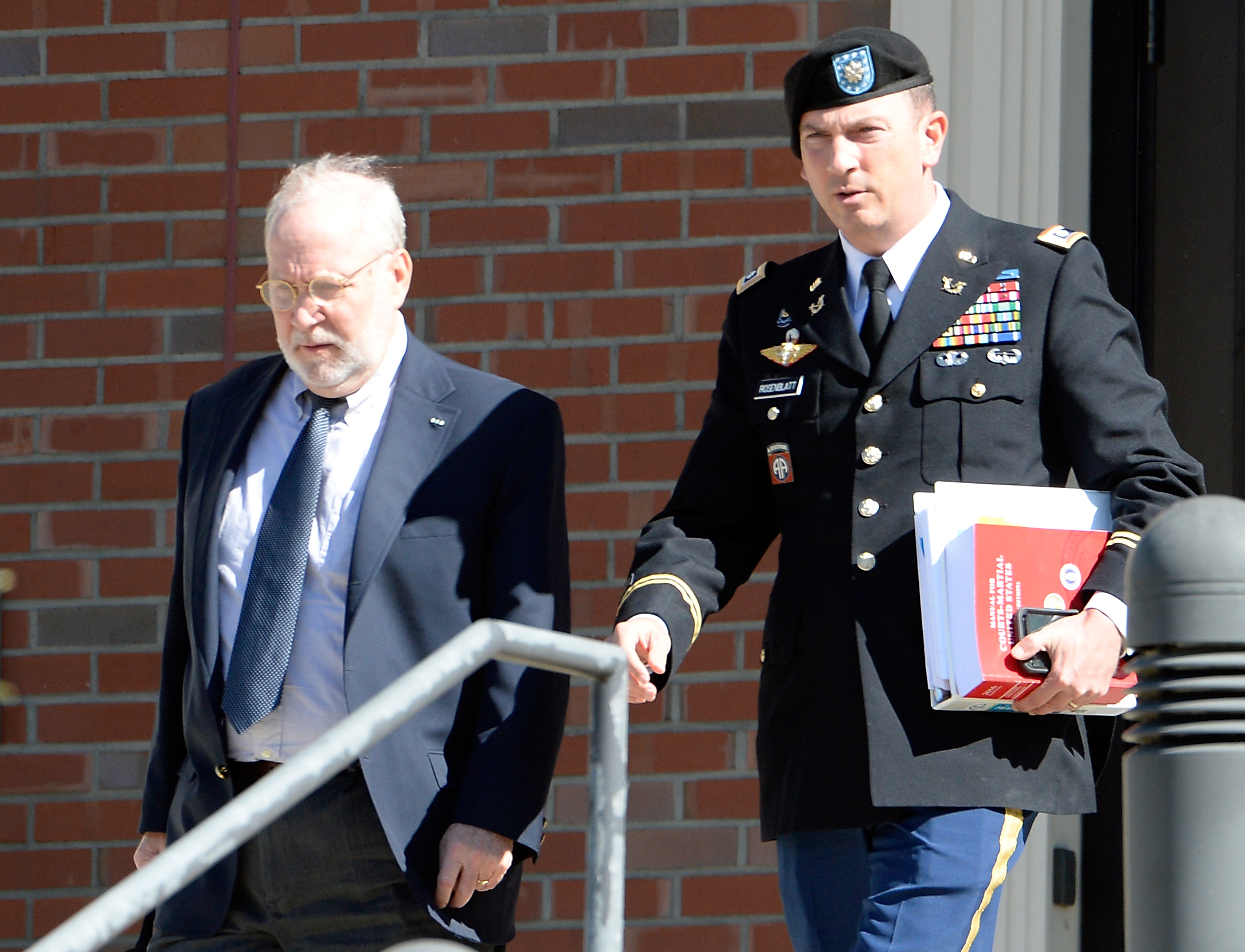 Attorneys for Army Sgt. Bowe Bergdahl — Eugene R. Fidell, left, and Army Lt. Col. Franklin D. Rosenblatt — leave the Ft. Bragg military courthouse on Thursday in Ft. Bragg, N.C. (Getty Images)