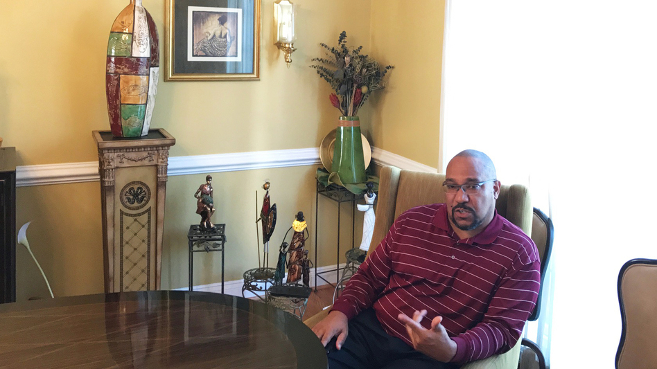 Phillip Thompson is a Gulf War veteran and a lawyer with his own practice. When he moved to his exclusive Leesburg, Va., enclave more than a decade ago, many of his mostly white neighbors assumed he had to be a professional athlete to afford his home. (Brakkton Booker/NPR)