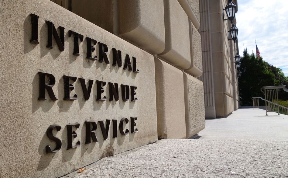 The Justice Department has entered settlements for two cases related to IRS scrutiny of groups seeking tax-exempt status. (Karen Bleier/AFP/Getty Images)