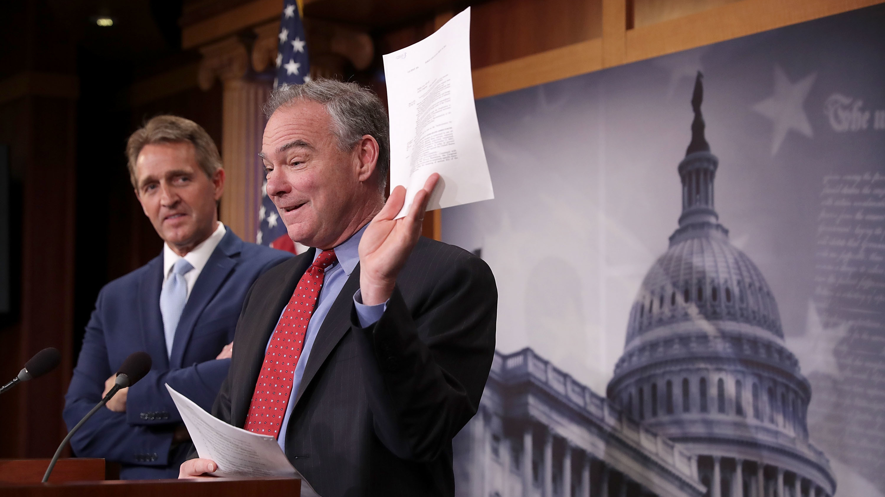 Sen. Jeff Flake, R-Ariz., and Sen. Tim Kaine, D-Va., talk about their introduction of a new Authorization for the Use of Military Force against ISIS, al-Qaida and the Taliban during a news conference at the U.S. Capitol on May 25, 2017. (Getty Images)
