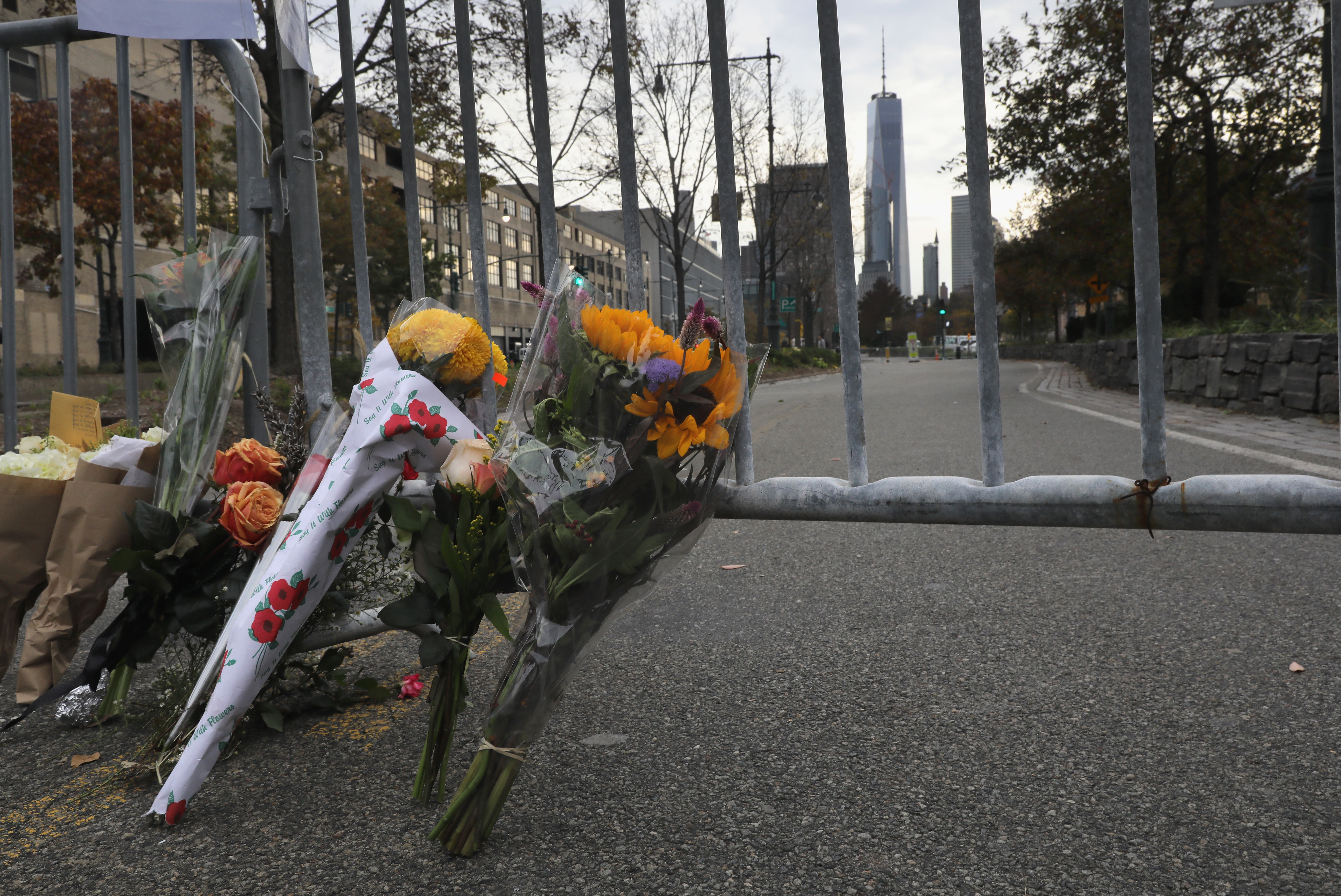 A makeshift memorial stands on a bike path in Lower Manhattan on Wednesday. Eight people on the path were killed in a truck attack Tuesday.