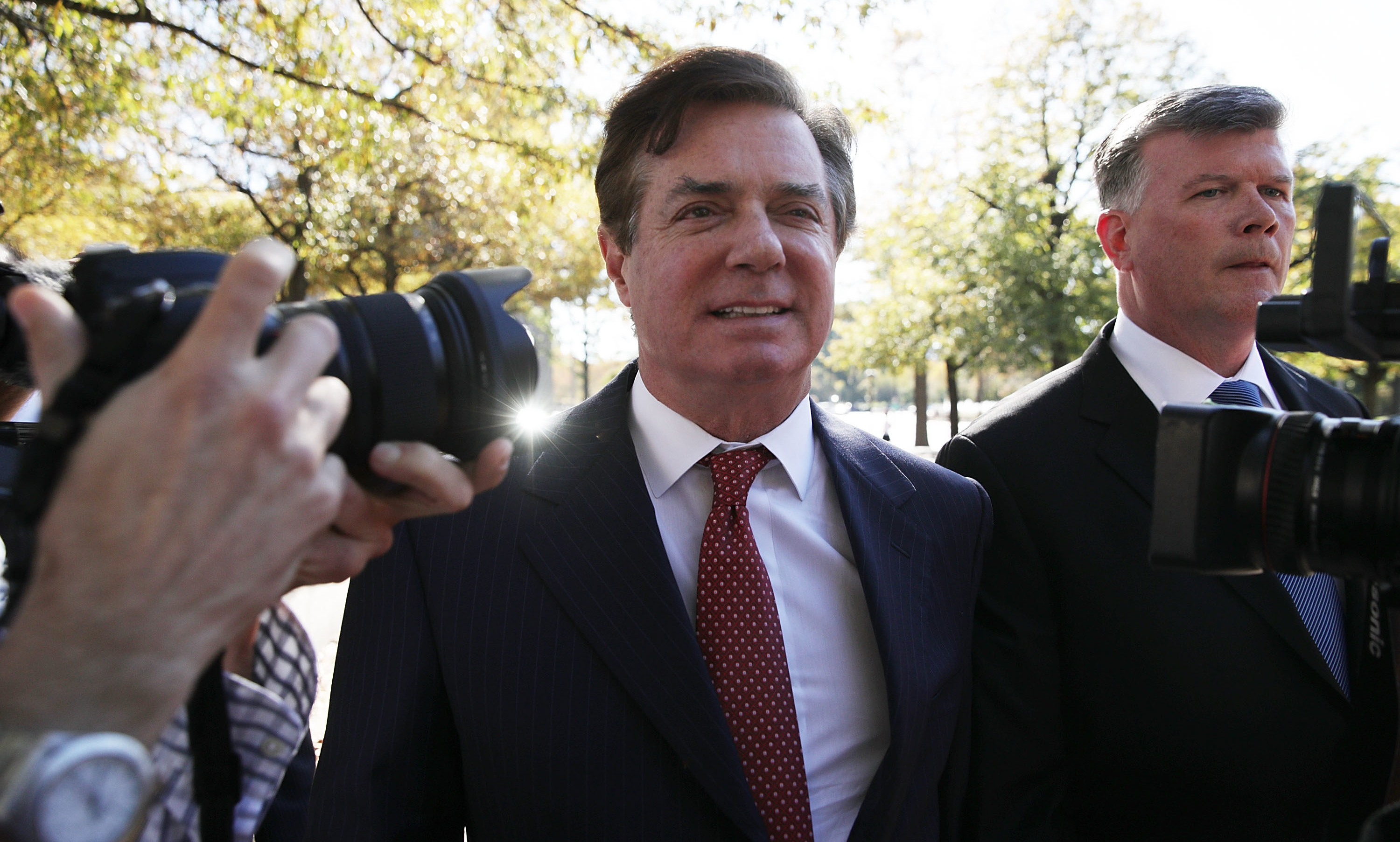 Former Trump campaign chairman Paul Manafort (left) arrives at a federal courthouse with his attorney Kevin Downing on Thursday in Washington, D.C. (Getty Images)