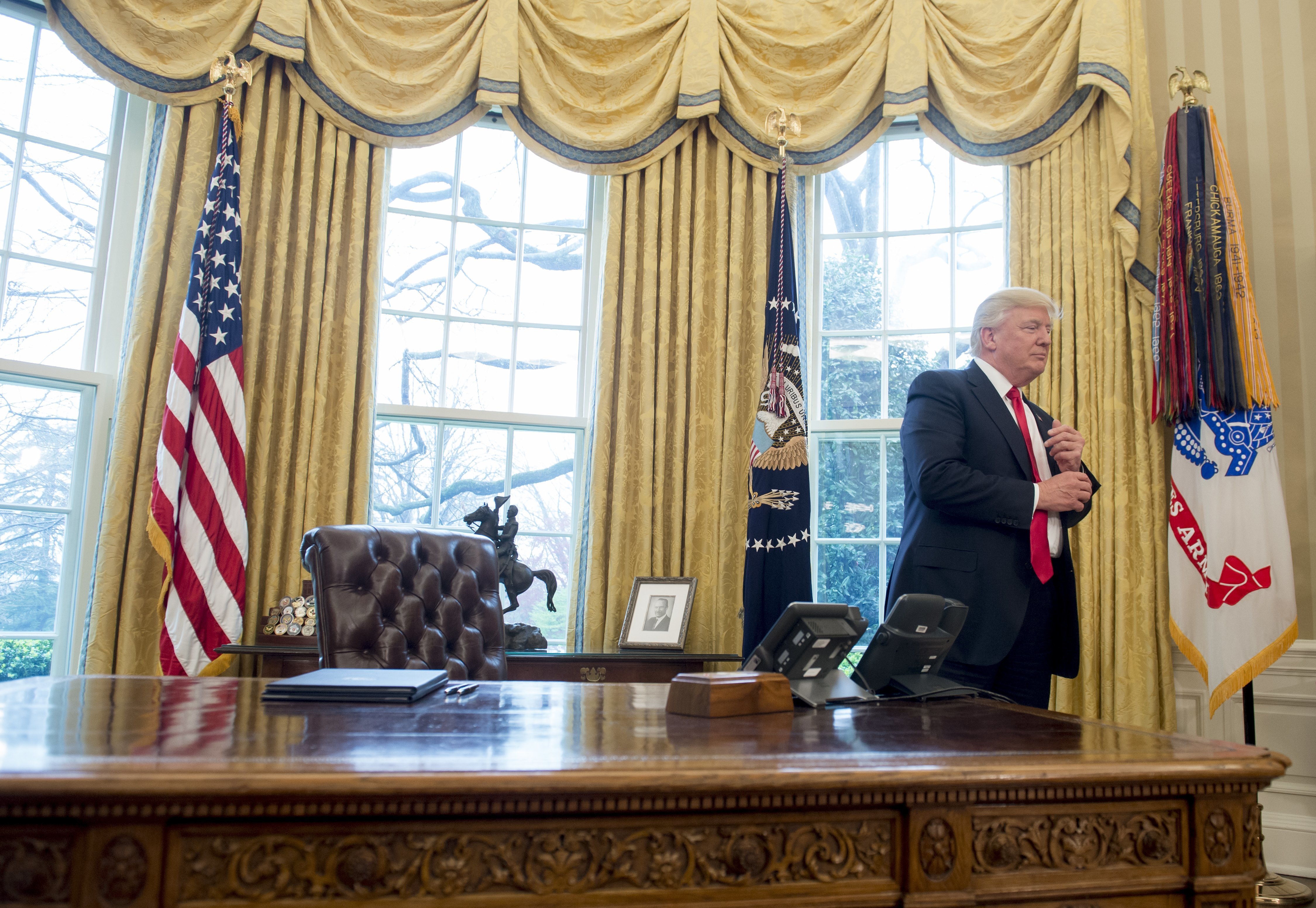 When his back is against the wall, President Trump goes back to where he derives energy — his base. That includes a large percentage of whites without a college degree. (AFP/Getty Images)