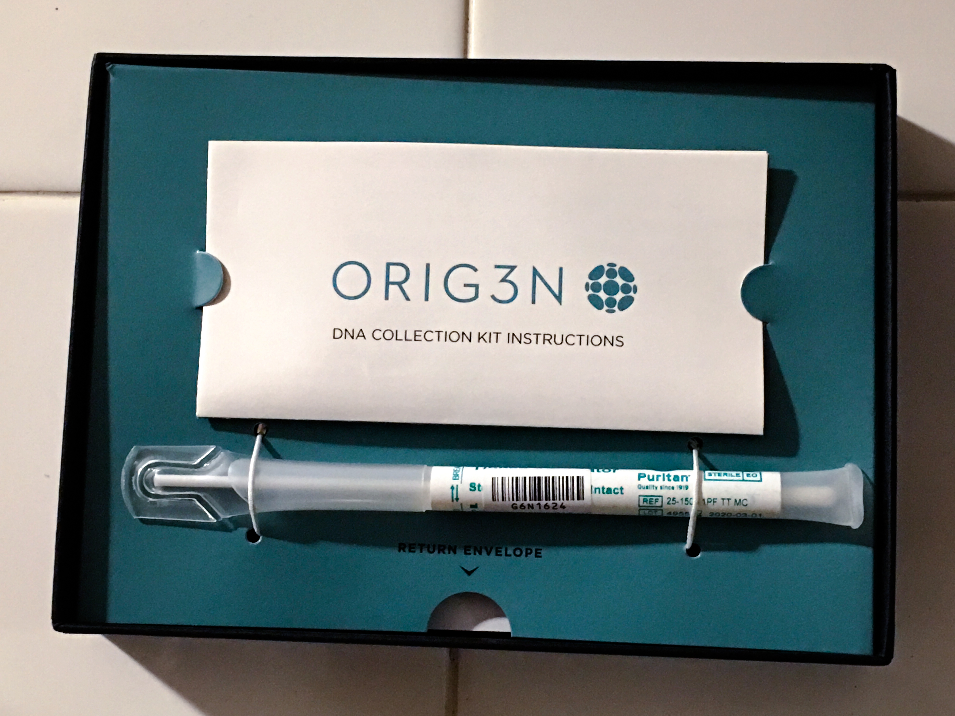The Boston-based company Orig3n has been offering free genetic testing at pro sports games. (Douglas Levy for NPR)