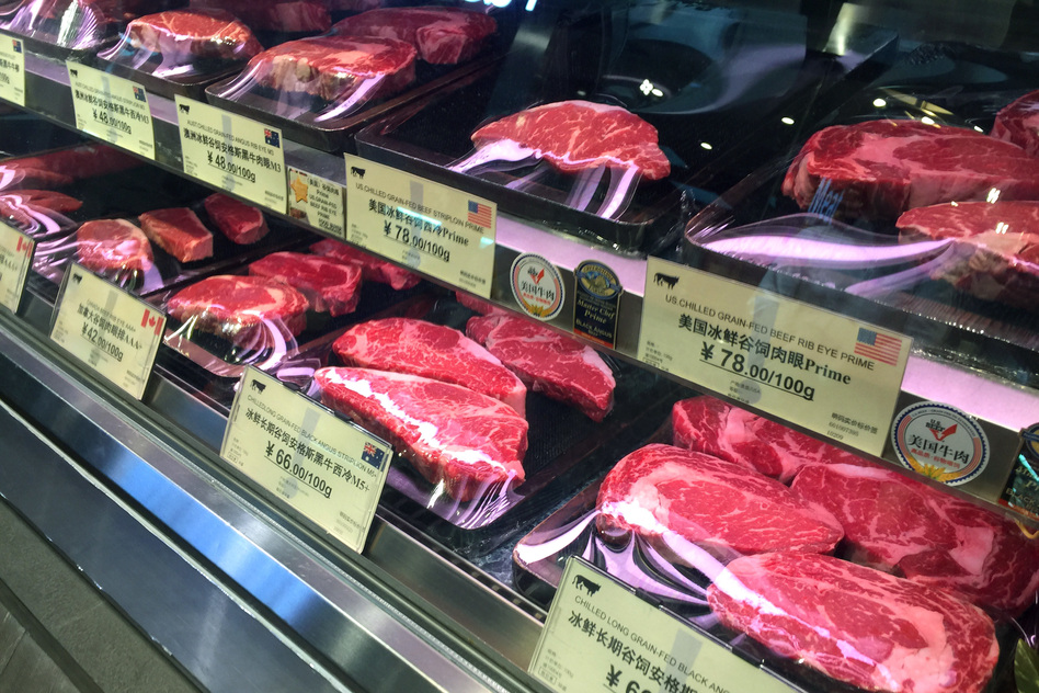 U.S. steak is sold among cuts of beef from Australia and New Zealand. Because the U.S. lacks a free trade agreement with China, its beef is expensive in China. As a result, it doesn't sell as well as beef from competing markets. (Rob Schmitz/NPR)