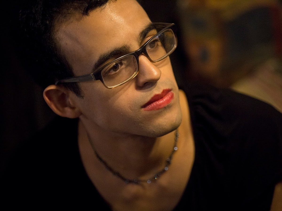 Edanry Rivera, 27, recently came under attack at a grocery store when some women told her &quot;you better watch out when you go outside.&quot; (WBUR)