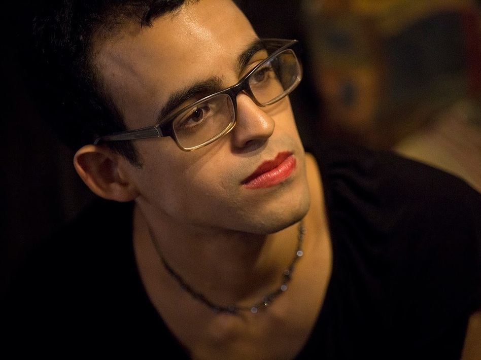 Edanry Rivera, 27, recently came under attack at a grocery store when some women told her "you better watch out when you go outside." (Jesse Costa/WBUR)