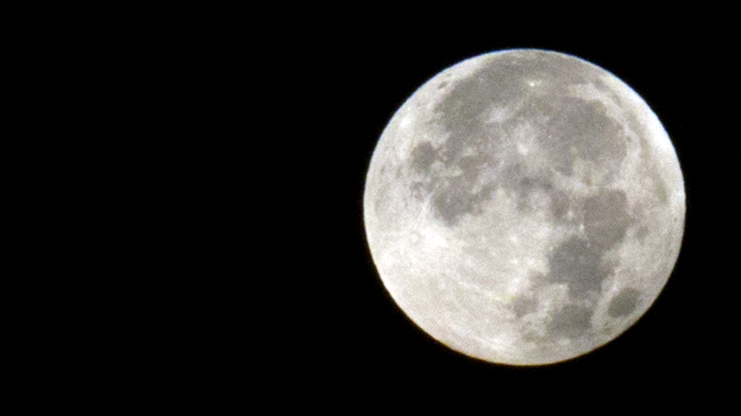 A supermoon appears above Antwerp, Belgium, on Sept. 28, 2015. Andy Weir