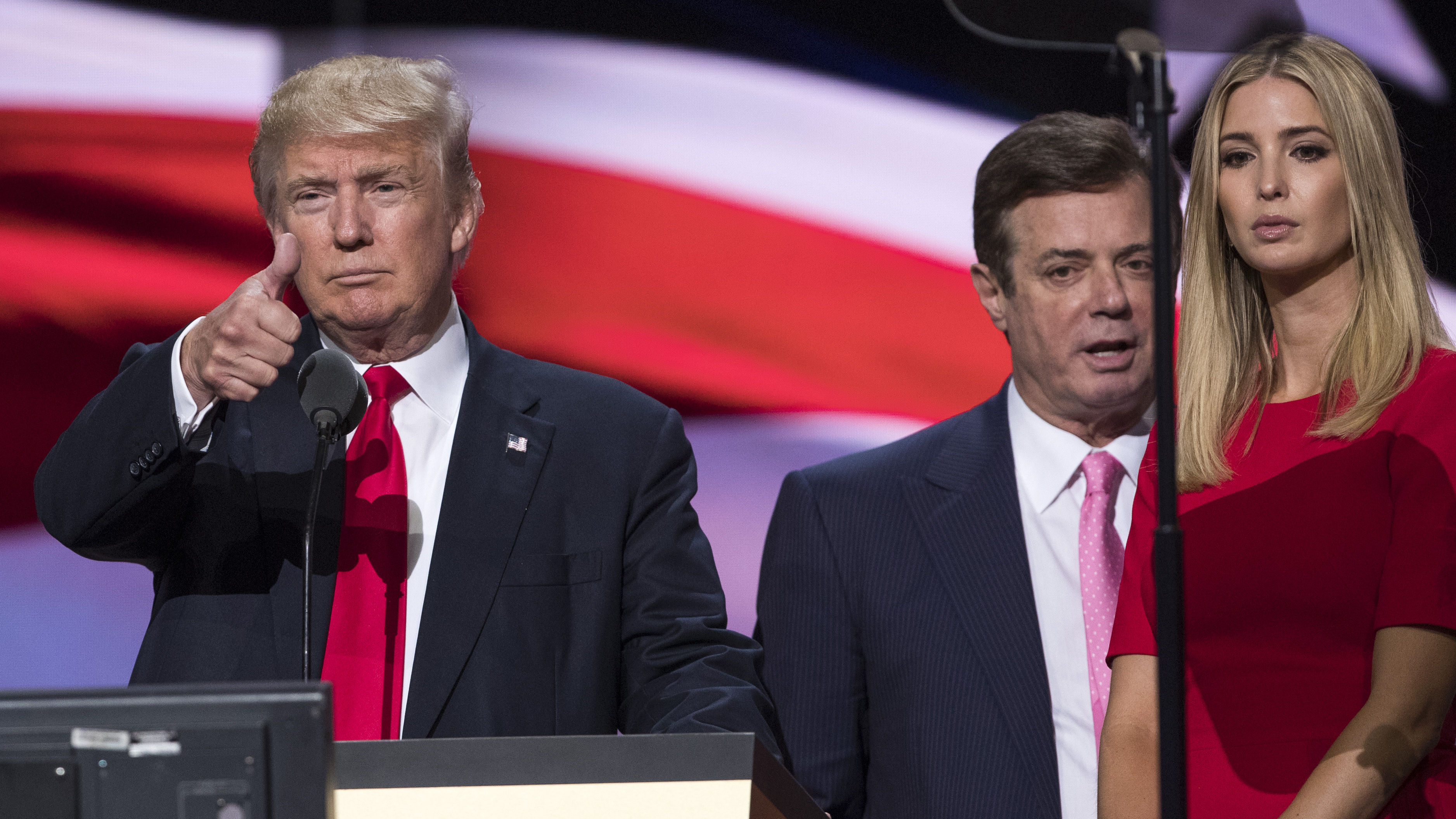 President Trump gives a thumbs up at the Republican National Convention, as then-Trump campaign Chairman Paul Manafort stands behind him and next to Ivanka Trump.