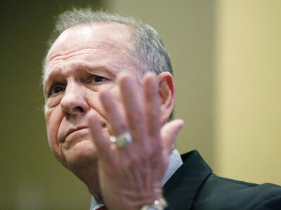 Top Republicans are urging Senate candidate Roy Moore to step aside but have few options if he refuses. (Brynn Anderson/AP)