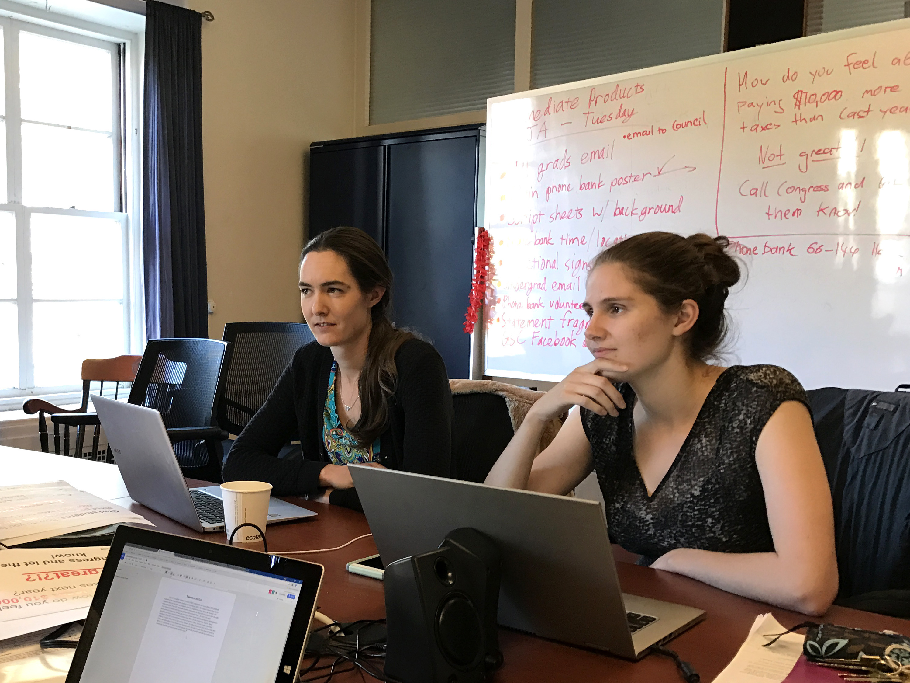 Students Kate Shulenberger (left) and Sarah Goodman on the Massachusetts Institute of Technology's Graduate Student Council plan a &quot;call your congressman&quot; event on campus. (NPR)