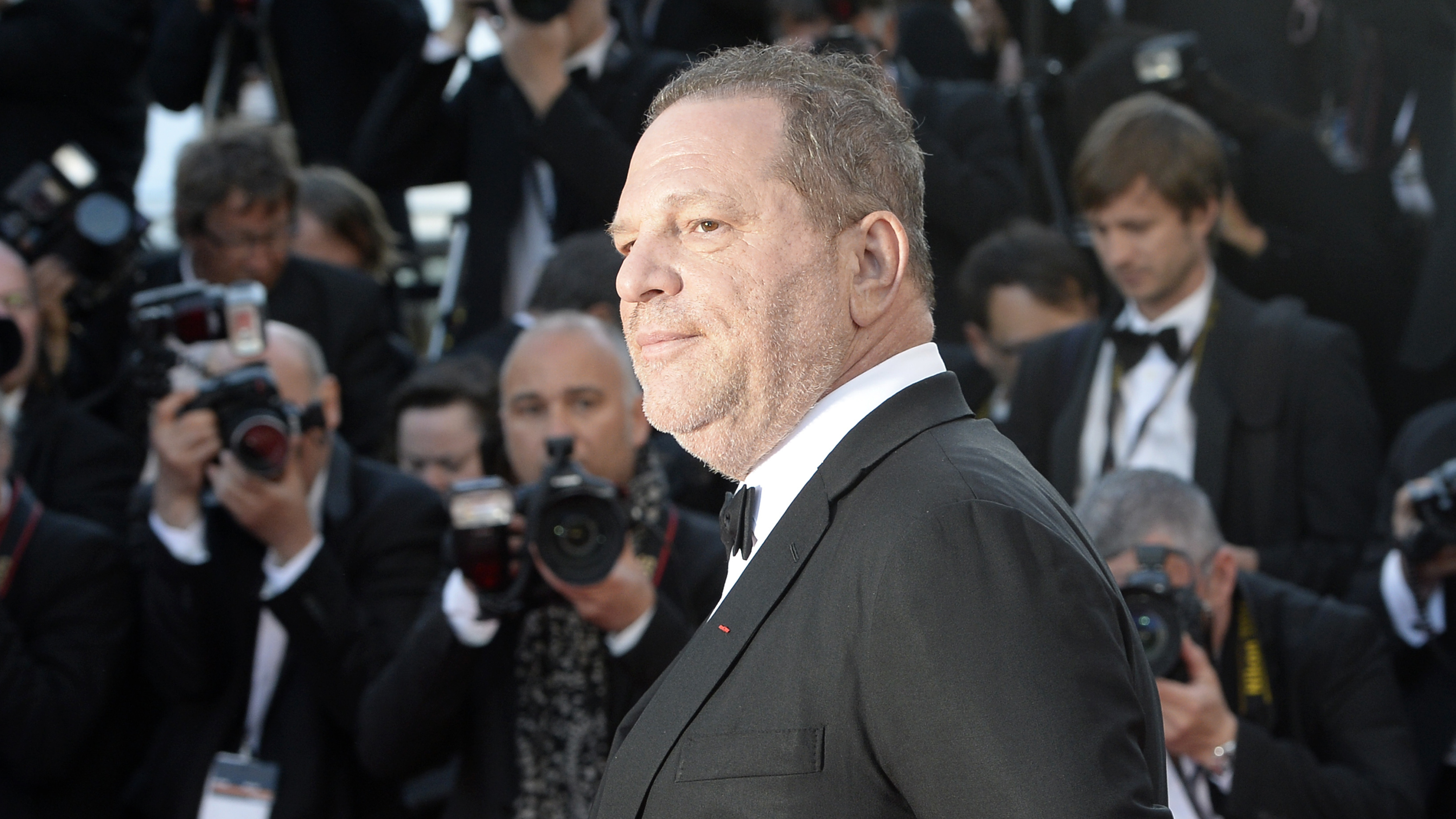Harvey Weinstein poses on the red carpet of the 2013 Cannes Film Festival. Weinstein is the subject of numerous allegations of sexual harassment spanning decades. (AFP/Getty Images)