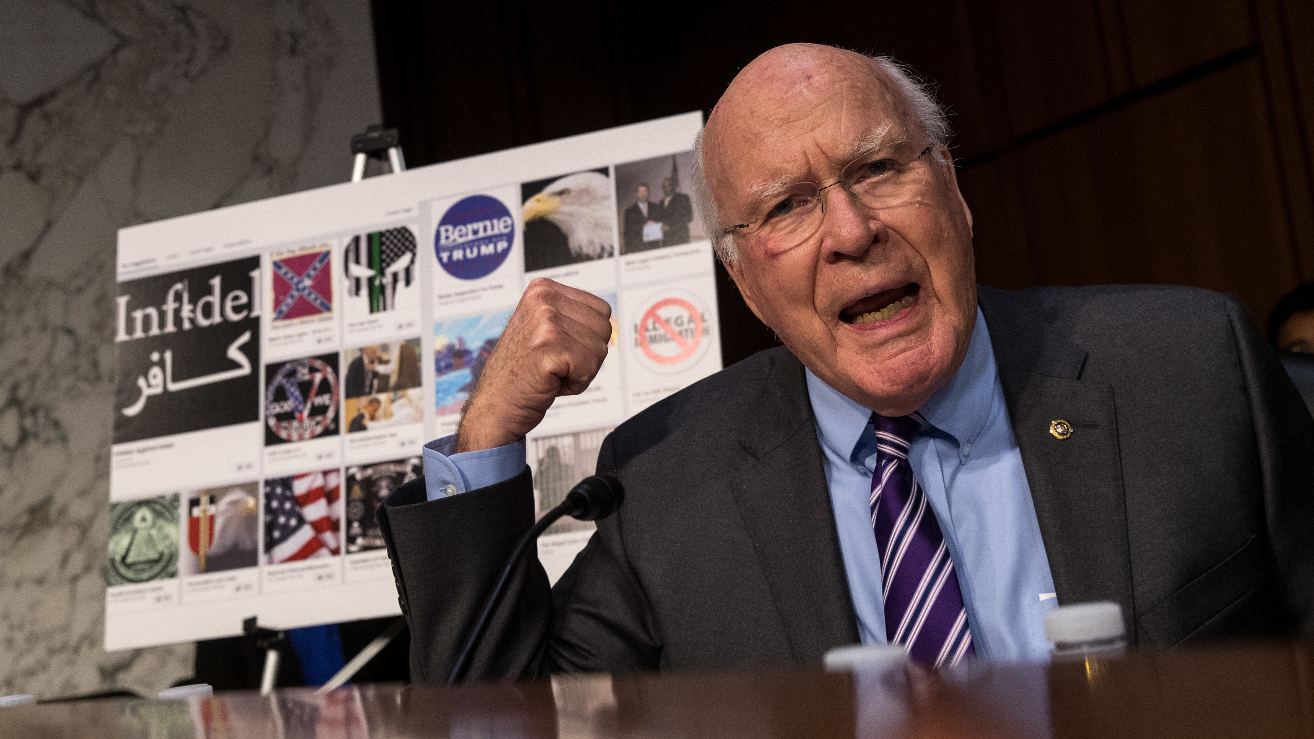 With examples of Russian-created Facebook pages behind him, Sen. Patrick Leahy, D-Vt., questions witnesses from social media companies during a hearing on Capitol Hill. (Getty Images)