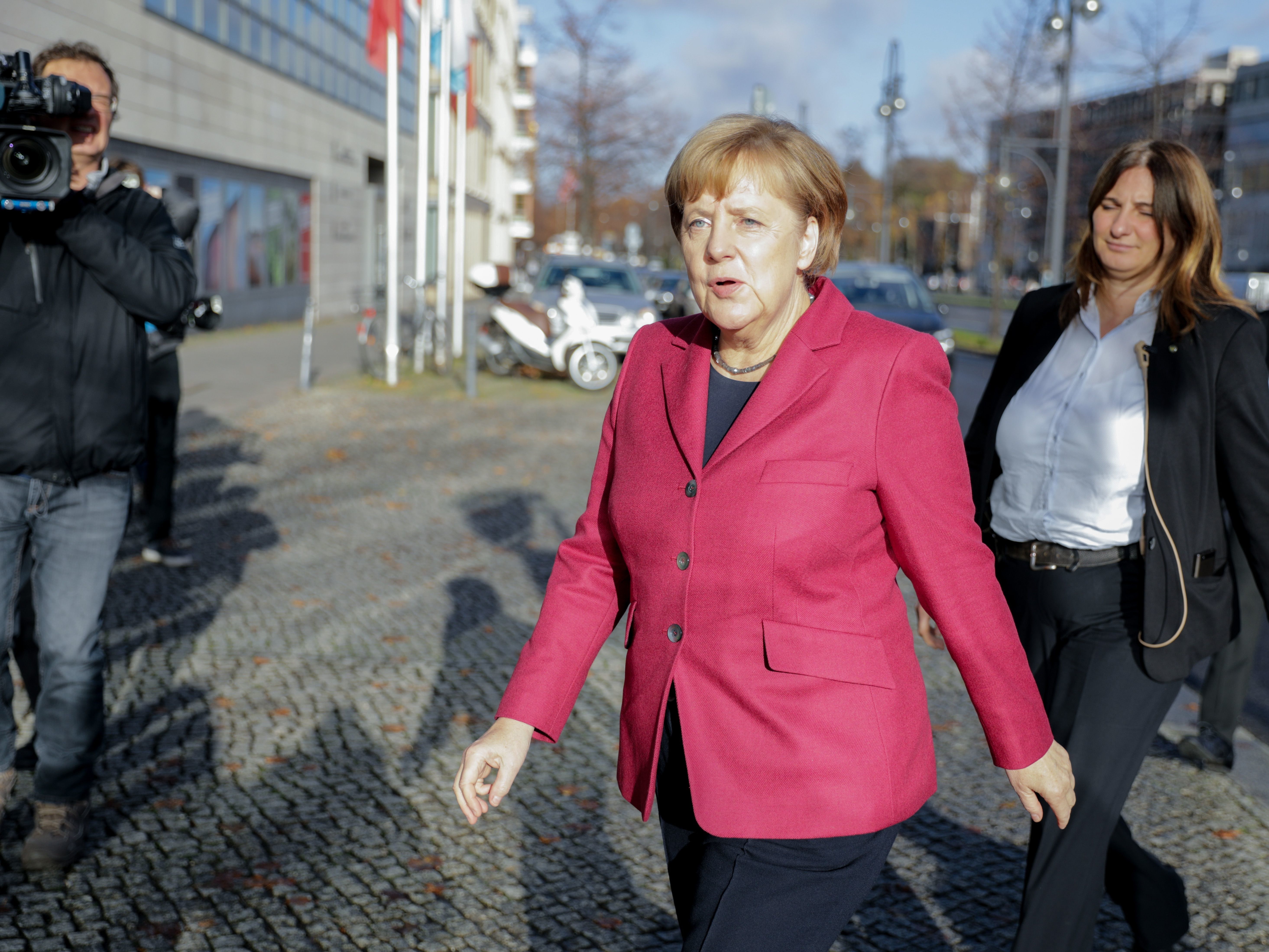 German Chancellor Angela Merkel arrives at her Berlin party headquarters Friday for talks with members of potential coalition parties to form a new government. (AFP/Getty Images)