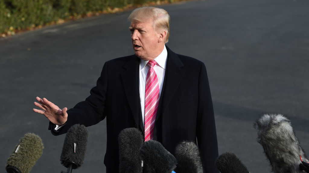 President Trump speaks to the press before departing from the South Lawn of the White House. (AFP/Getty Images)