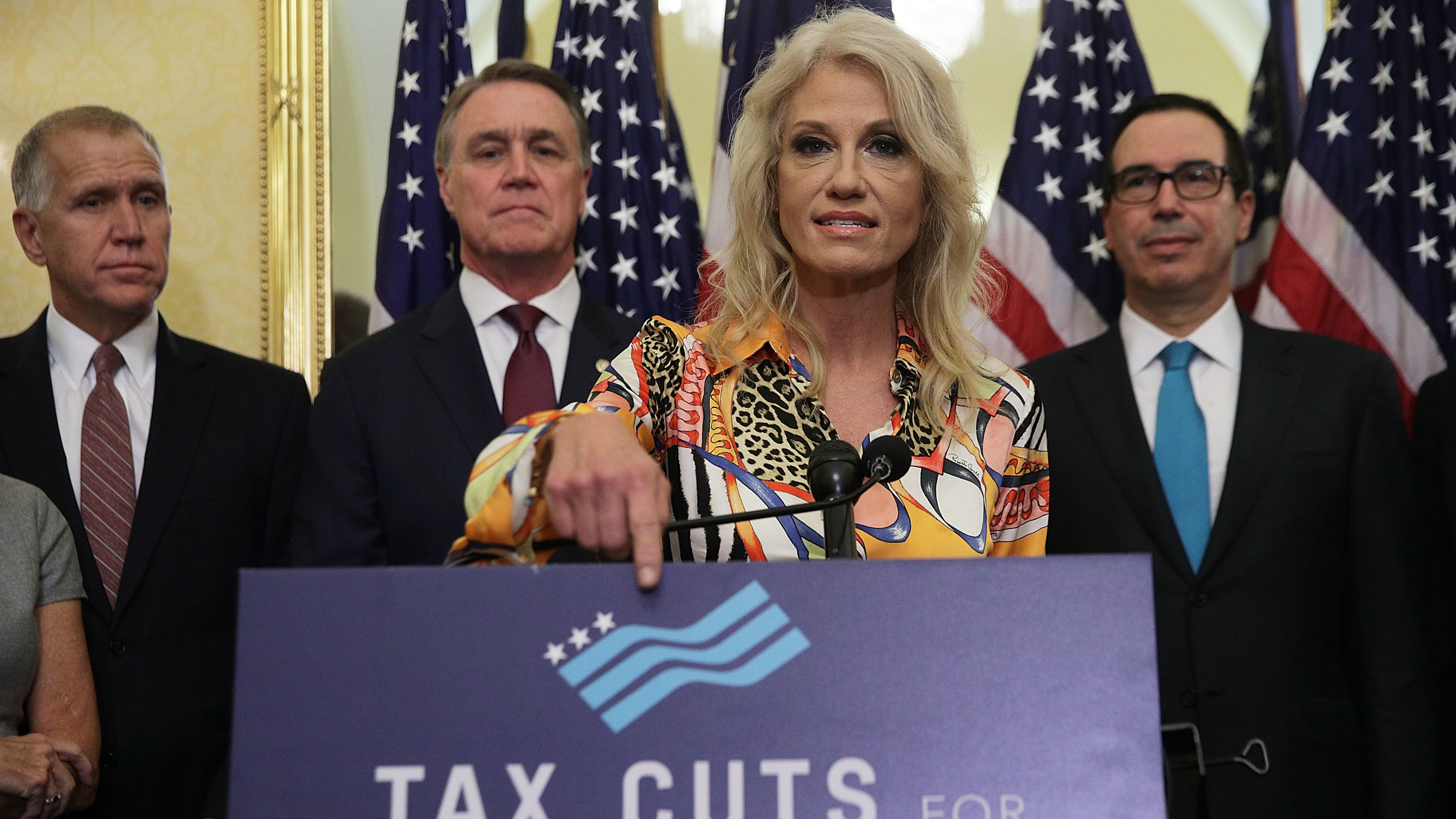 White House counselor Kellyanne Conway speaks at a press conference with (from left) Republican Sens. Thom Tillis and David Perdue, and Treasury Secretary Steve Mnuchin on Nov. 7. Only 2 percent of economists polled thought the GOP tax plan would lead to higher growth. (Getty Images)