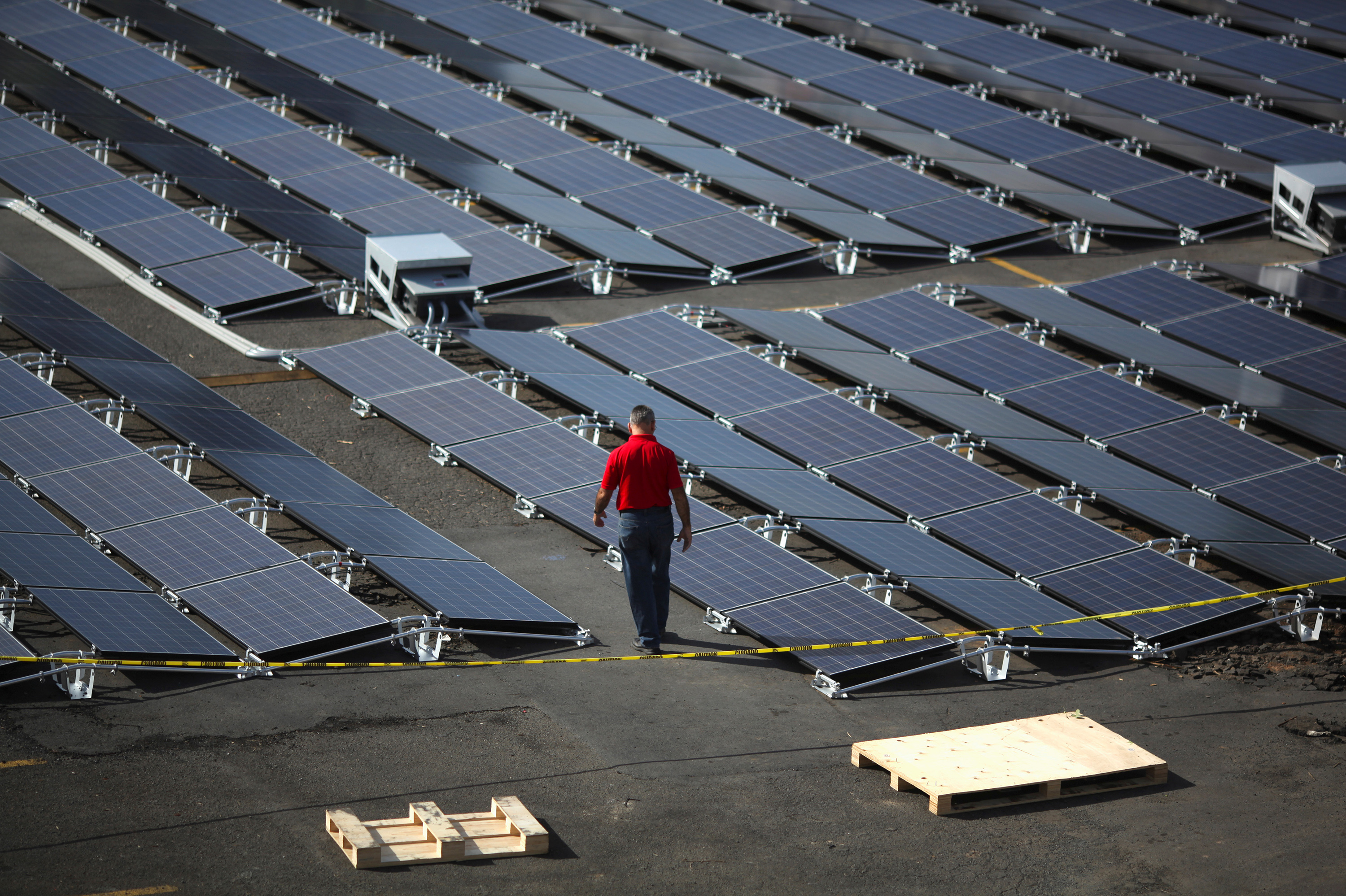 These solar panels were set up by Tesla at the San Juan Children's Hospital after the island was hit by Hurricane Maria. (Alvin Baez/Reuters)
