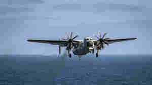 Search Continues For Missing Sailors After Navy Plane Crash In Philippine Sea