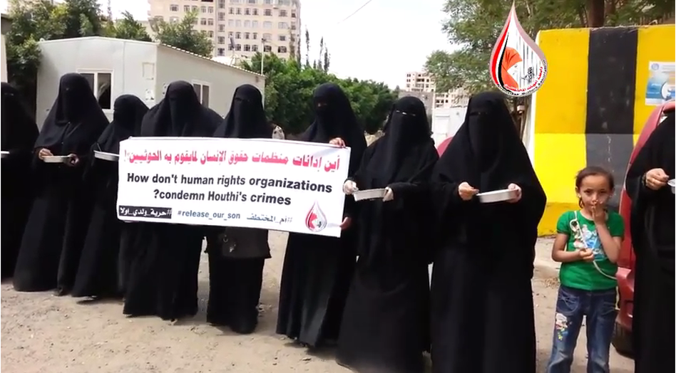 Women in Yemen protest outside the office of the country's High Commissioner for Human rights. ( رابطة أمهات المختطفين/NPR Screenshot)