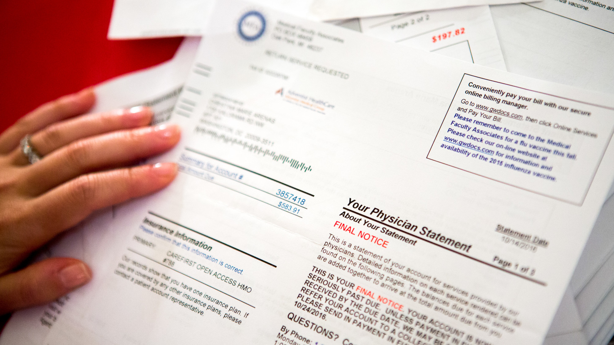 Christina Arenas reviews her medical bills at home in Washington, D.C. She complained about a mammogram and ultrasounds that she felt were unnecessary and sought a refund. (Allison Shelley)