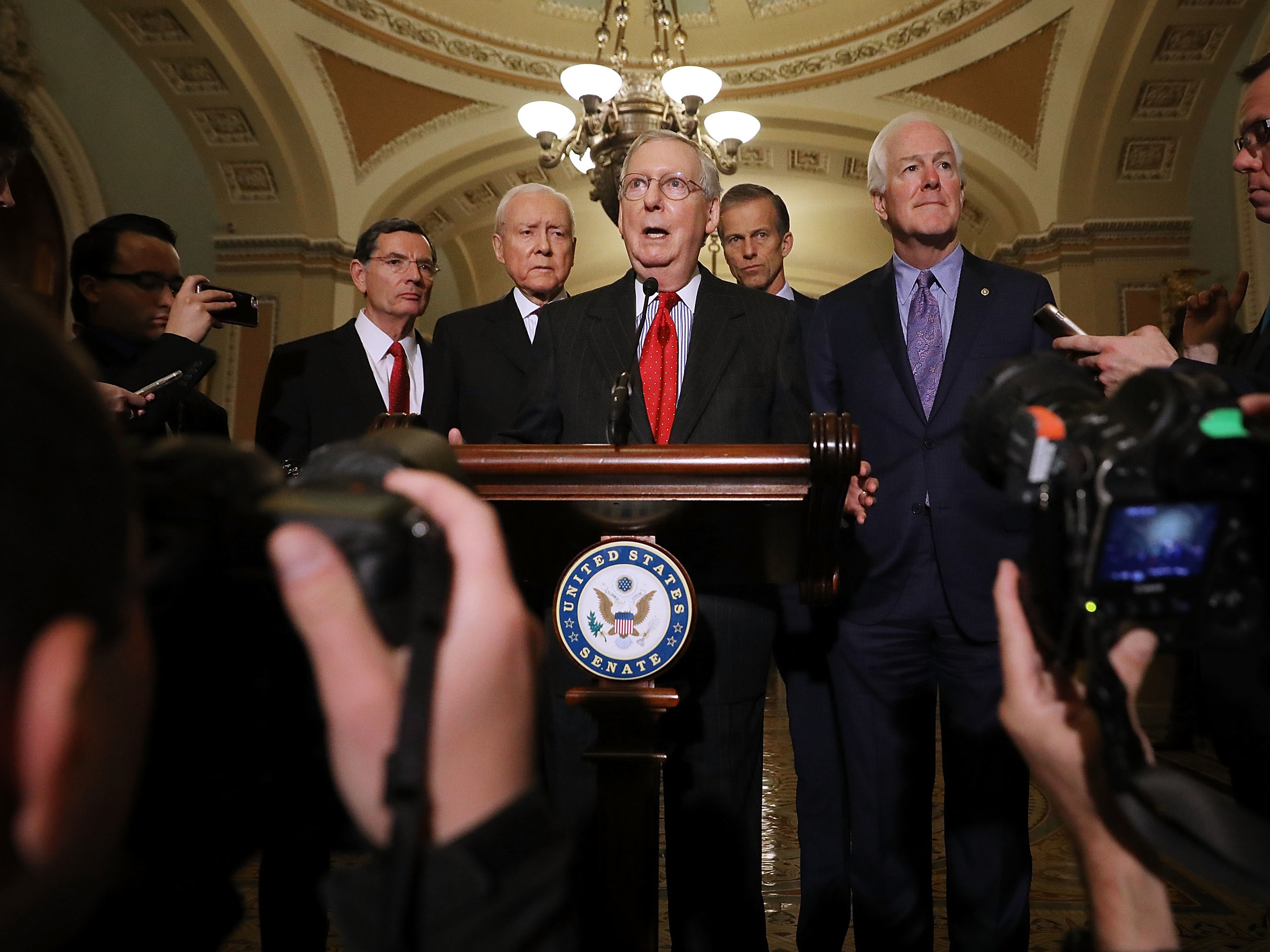 Republican Senate leaders, shown here speaking to reporters after the Republican Policy Committee luncheon at the Capitol Wednesday, are finalizing details of a tax plan they hope to vote on this week. (Getty Images)