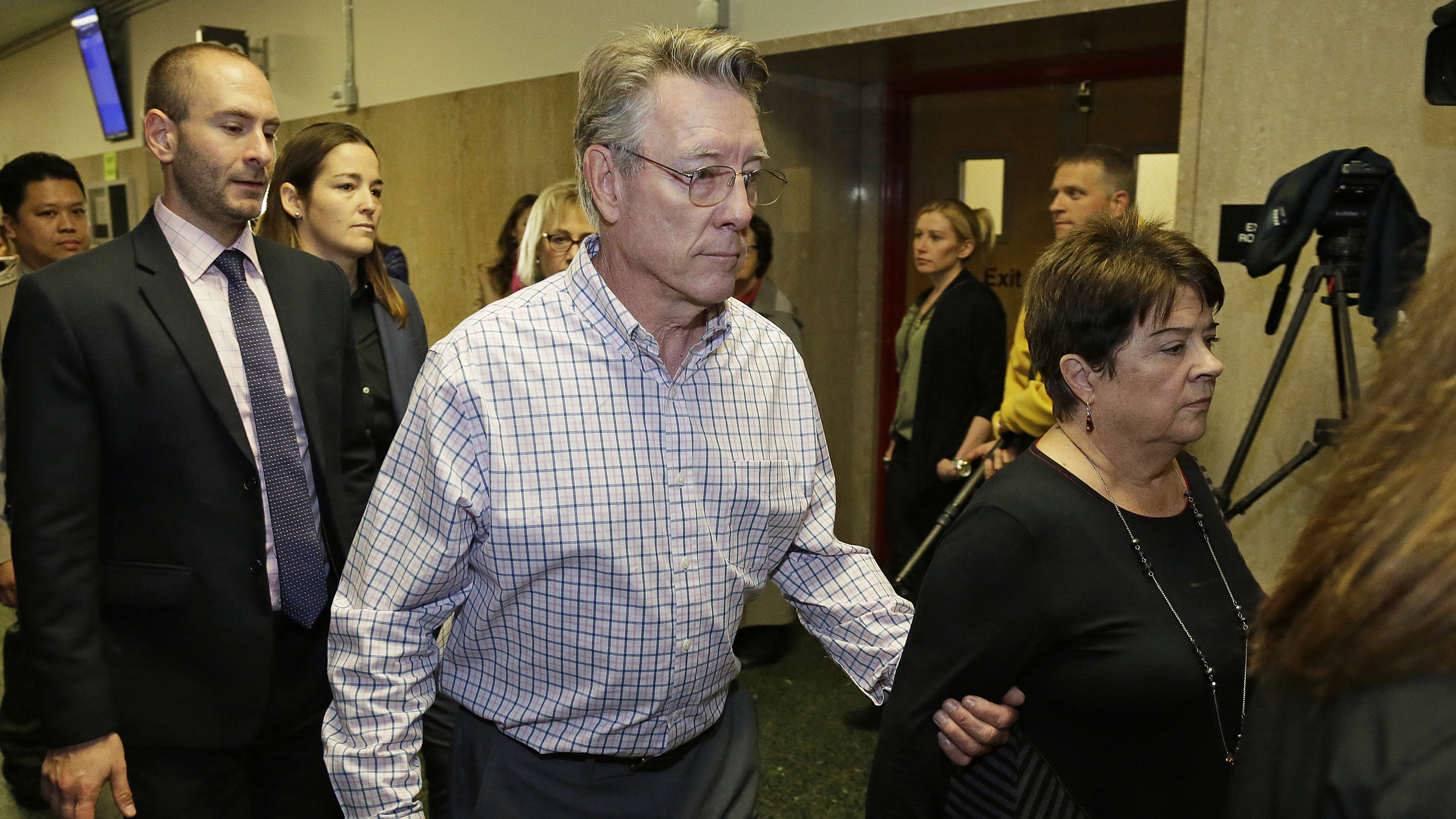 Kate Steinle's parents Jim Steinle and Liz Sullivan walk to a courtroom for closing arguments in the trial on Nov. 20