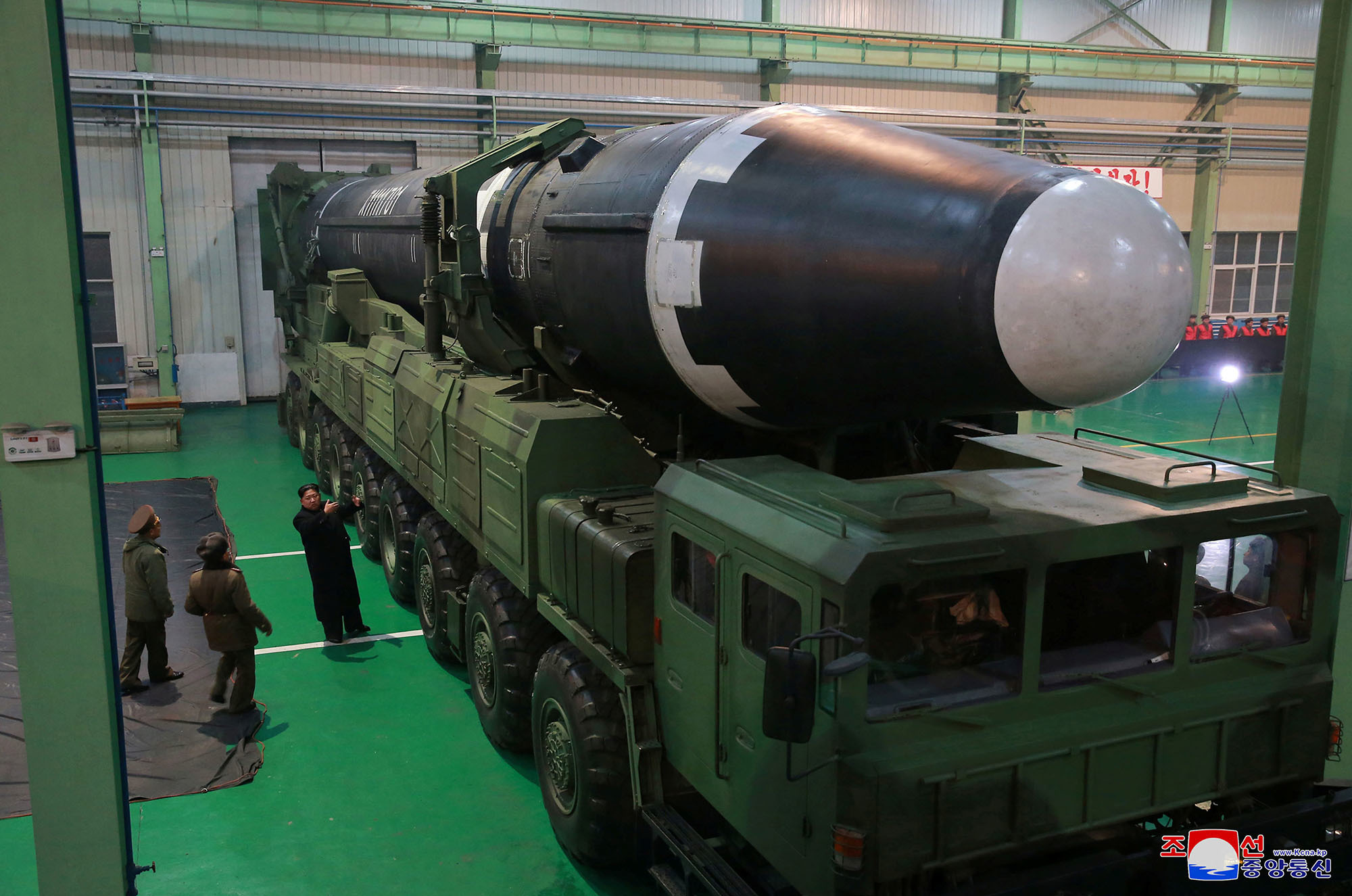 North Korean leader Kim Jong Un views the Hwasong-15 missile in this undated photo released by North Korea's Korean Central News Agency.