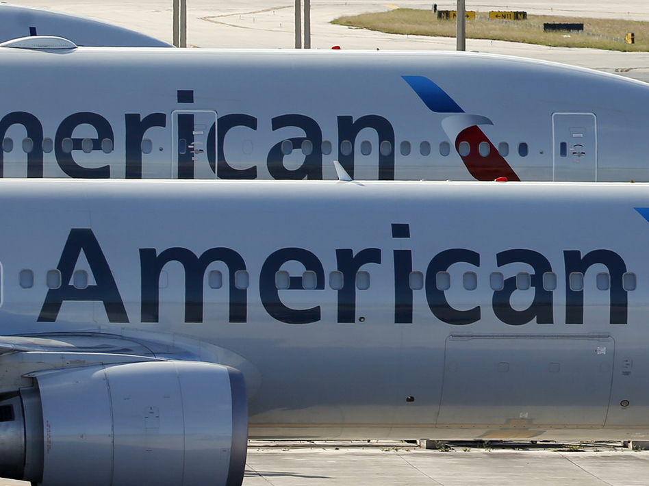 American Airlines has a deal with its pilots to keep its end-of-the-year flights staffed. The airline had inadvertently given too many pilots the holidays off. (Wilfredo Lee/AP)