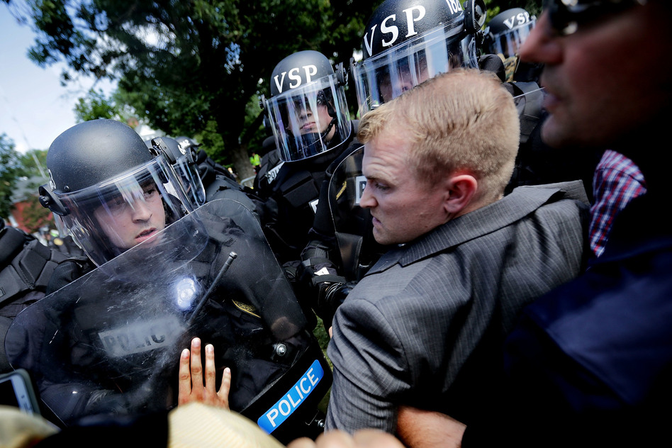 White nationalists clash with police as they are forced out of Emancipation Park after the "Unite the Right" rally Aug. 12 in Charlottesville, Va. (Chip Somodevilla/Getty Images)