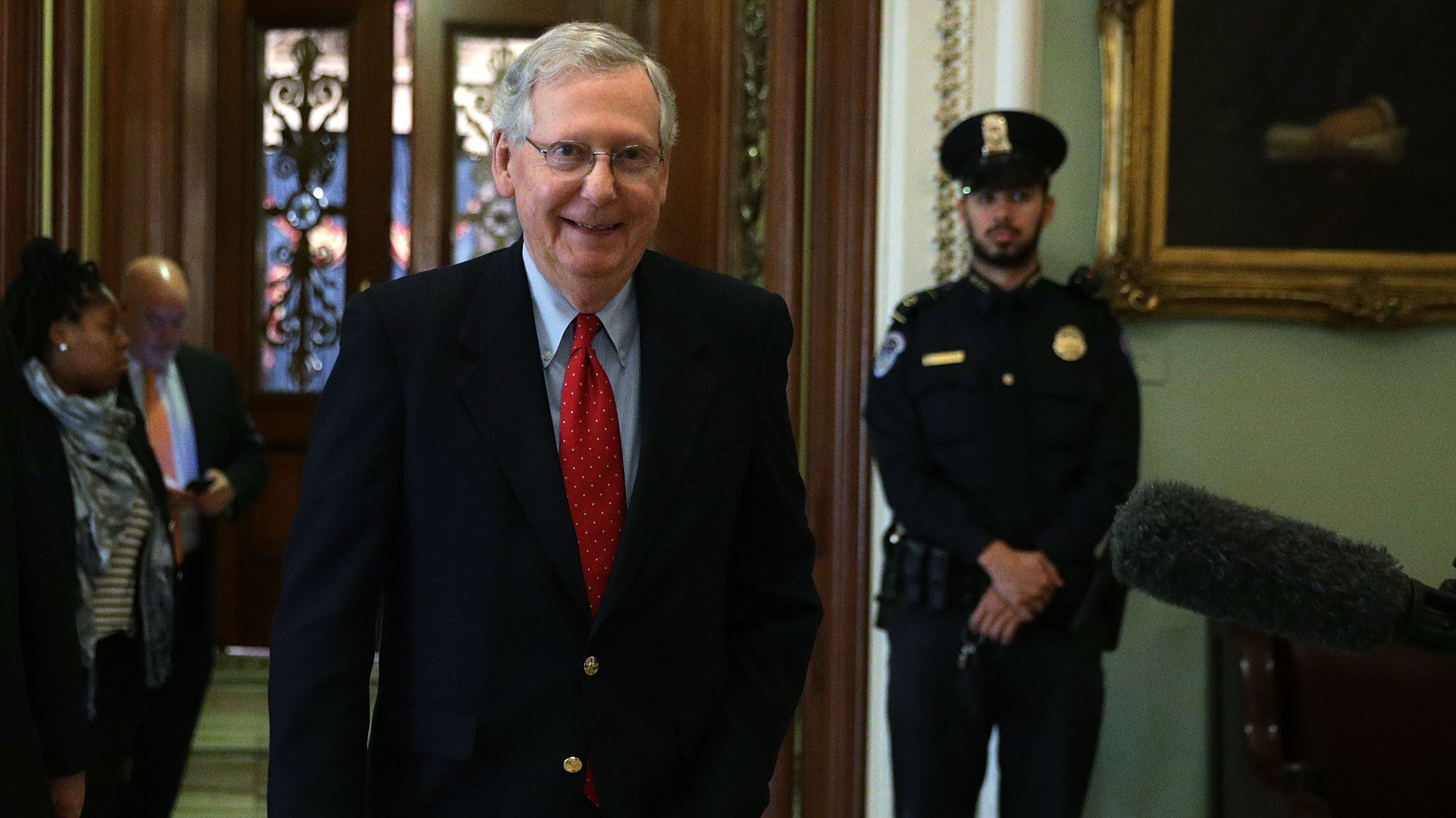 Senate Majority Leader Mitch McConnell said Friday that Republicans had the votes to pass a sweeping overhaul of the country's tax code. The measure passed early Saturday morning. (Getty Images)