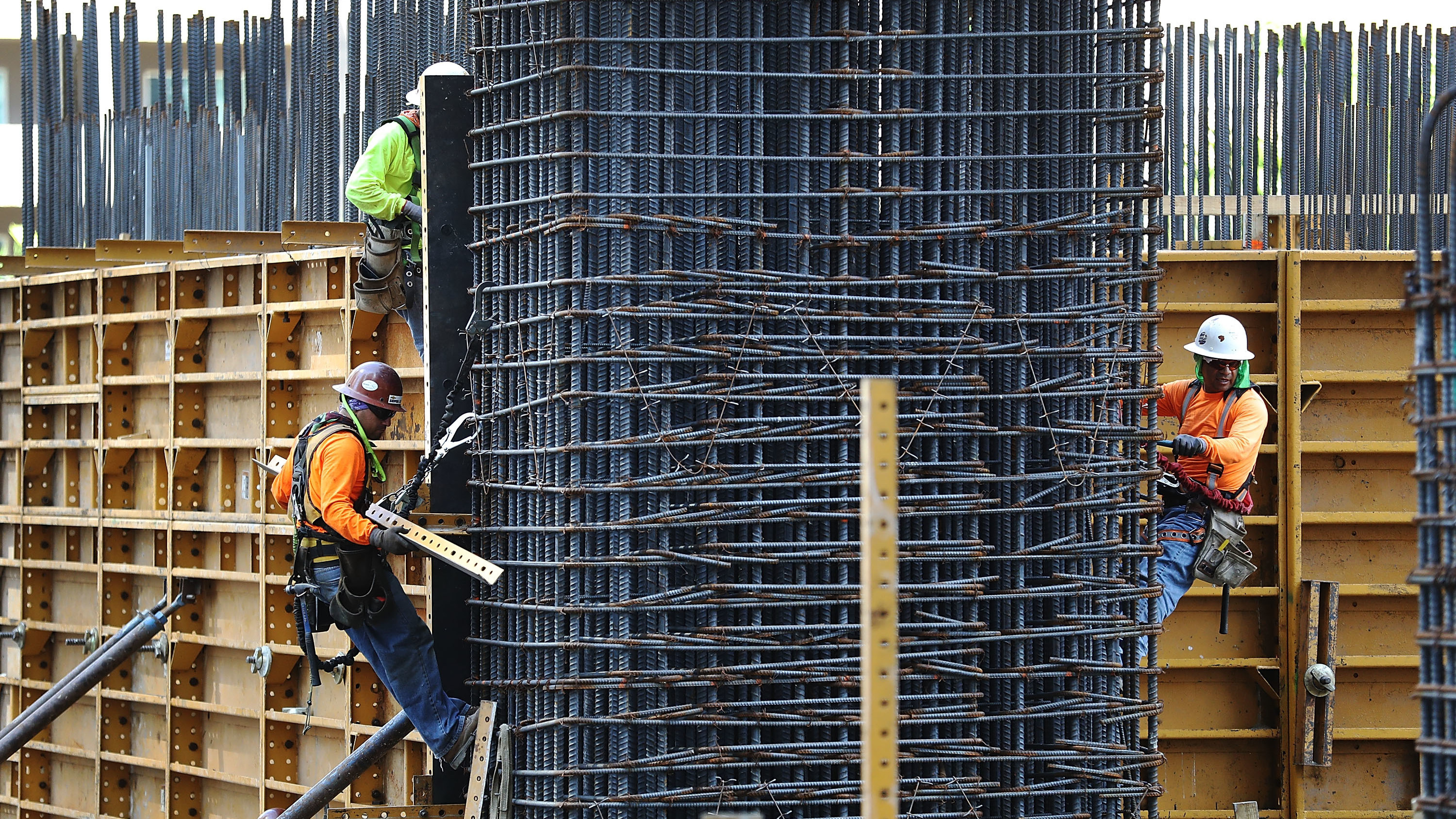 Construction workers at a site in Miami. Thousands of construction workers in the U.S. face the elimination of their temporary protected status and the prospect of deportation. (Getty Images)