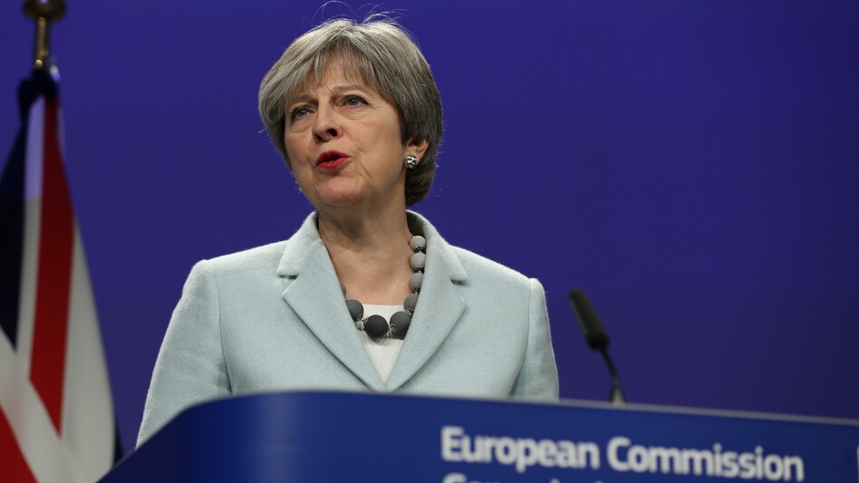 British Prime Minister Theresa May speaks during a joint news conference with European Commission Chief Jean-Claude Juncker in Brussels, Belgium on Friday. (Anadolu Agency/Getty Images)