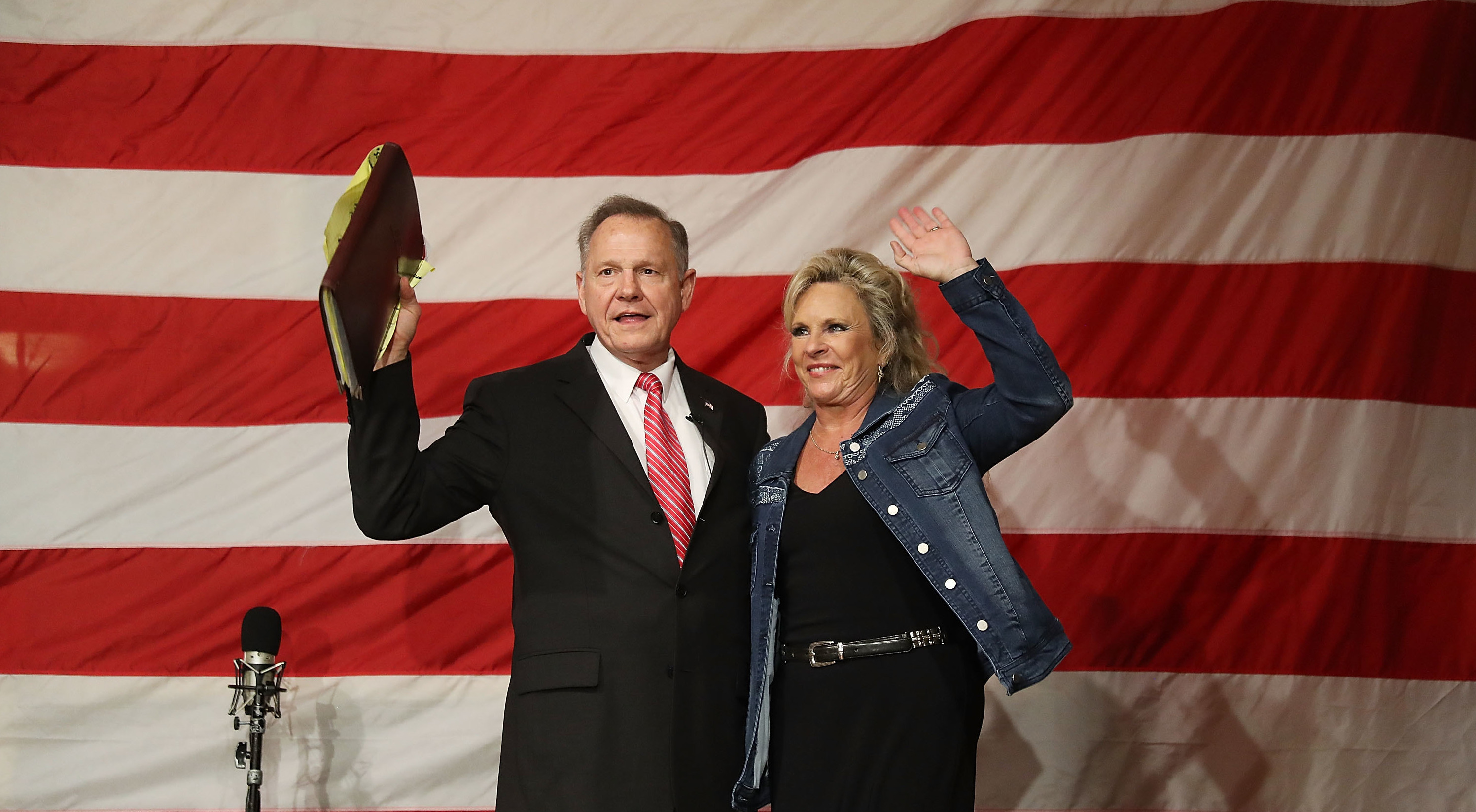 Alabama Republican senatorial candidate Roy Moore and his wife, Kayla, at a campaign event at Oak Hollow Farm in Fairhope, Ala., on Dec. 5. (Getty Images)