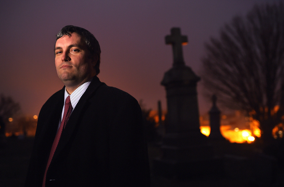 Brett Talley stands in Holy Rood Cemetery in Washington, D.C., in 2014. Talley had been rated "unanimously unqualified" for a lifetime judicial appointment and his nomination "will not be moving forward," according to a Trump administration official. (Matt McClain/The Washington Post via Getty Images)