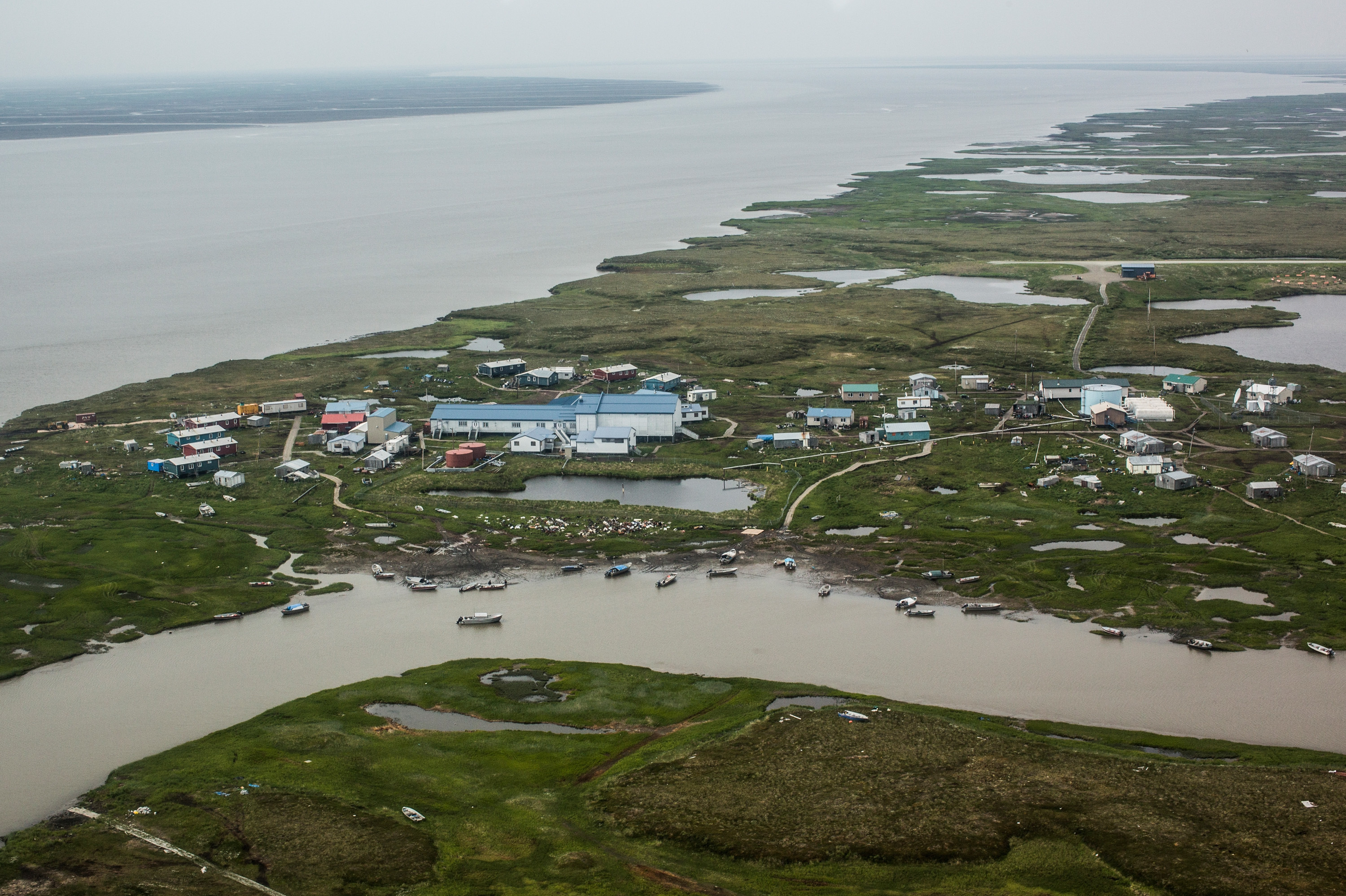 For Alaskan Coastal Village, Erosion Hits Home 3 The Alaskan village of Newtok, seen from a plane in 2015, is threatened by eroding land. The Yupik people have lived in coastal areas along the Bering Sea for thousands of years.