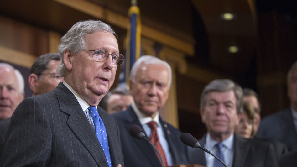 Senate Majority Leader Mitch McConnell (left) speaks at the press conference after the senate vote of the tax reform bill on Wednesday in Washington, D.C (Tasos Katopodis/Getty Images)