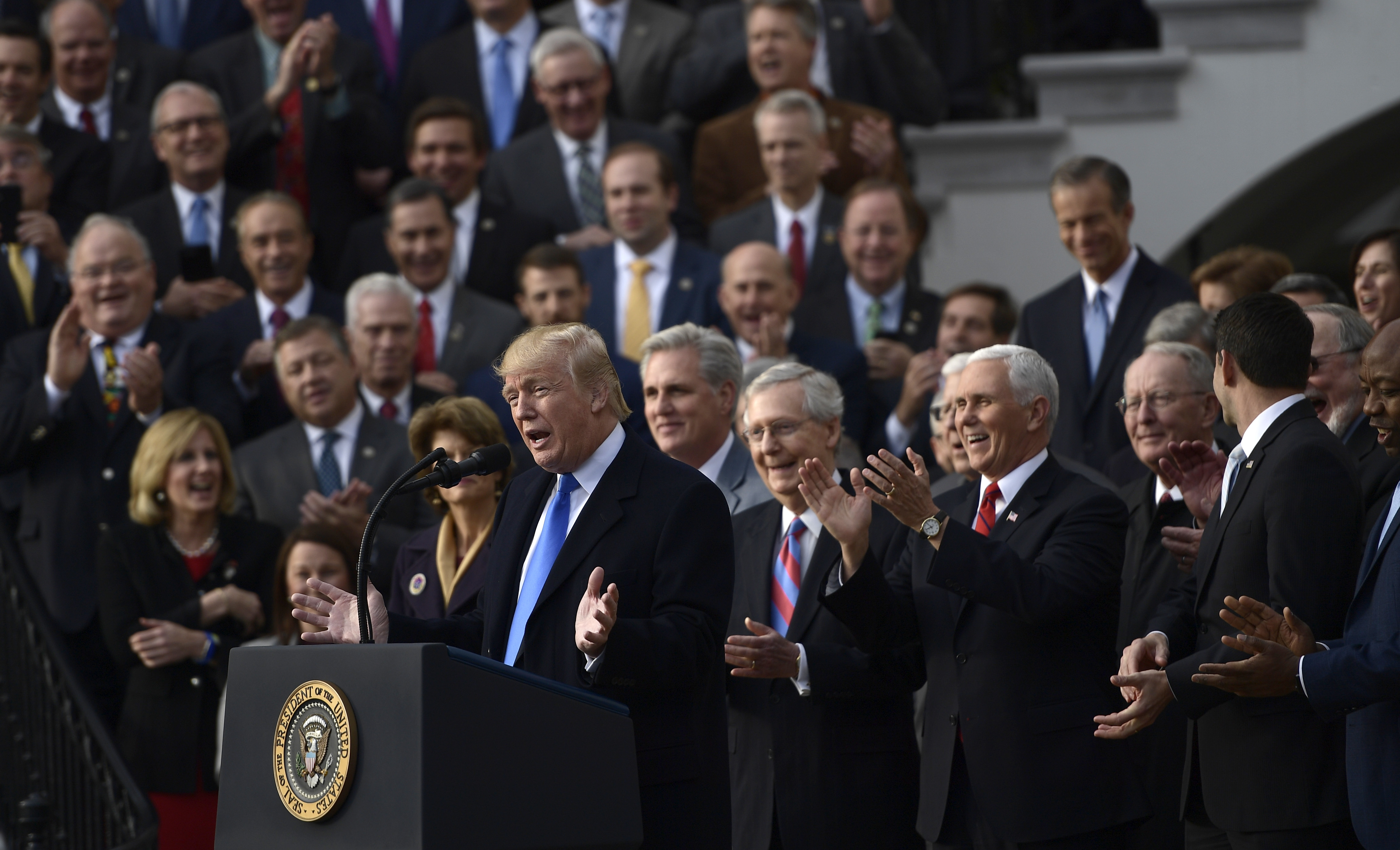 President Trump speaks about the passage of tax legislation on the South Lawn of the White House on Wednesday. (AFP/Getty Images)