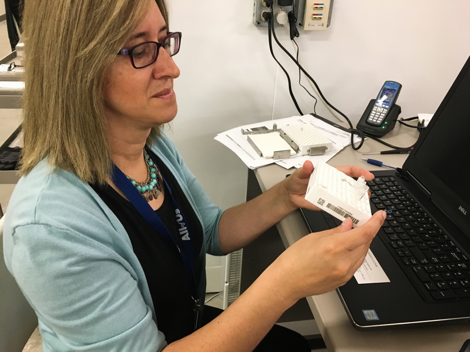 Mine Cicek, an assistant professor at the Mayo Clinic, processes samples for the All of Us program. (Richard Harris/NPR)