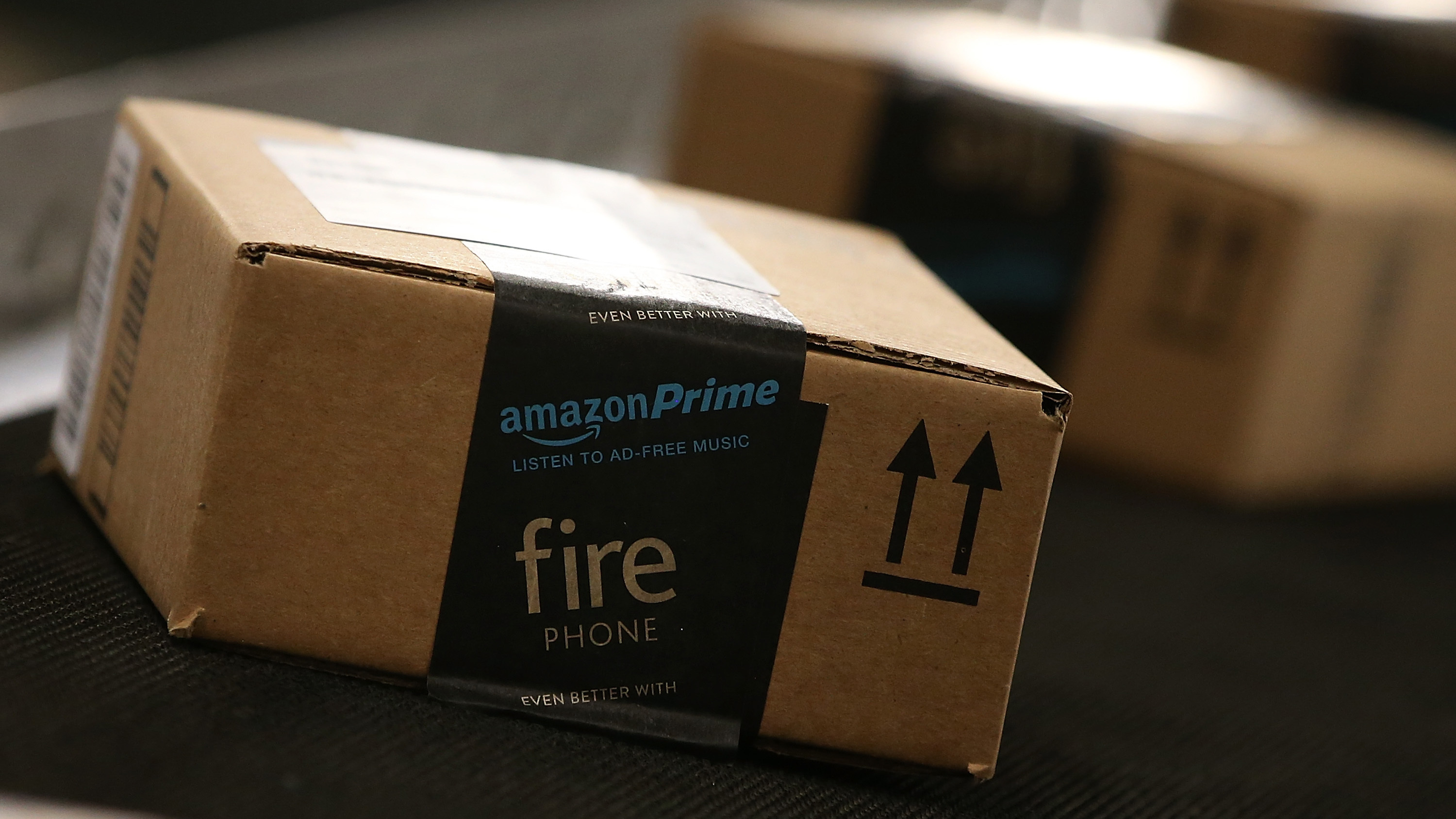 Boxes move along a conveyor belt at an Amazon fulfillment center in California. As more consumers shop online, law enforcement says they're receiving more reports of package theft, especially during the holidays. (Getty Images)