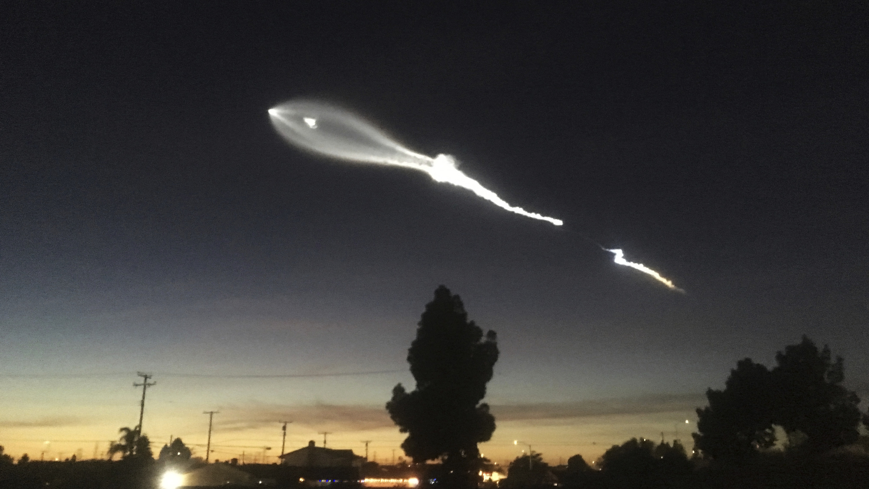 The contrail from a SpaceX Falcon 9 rocket is seen from Long Beach, Calif., more than 100 miles southeast from its launch site, the Vandenberg Air Force Base in California on Friday.