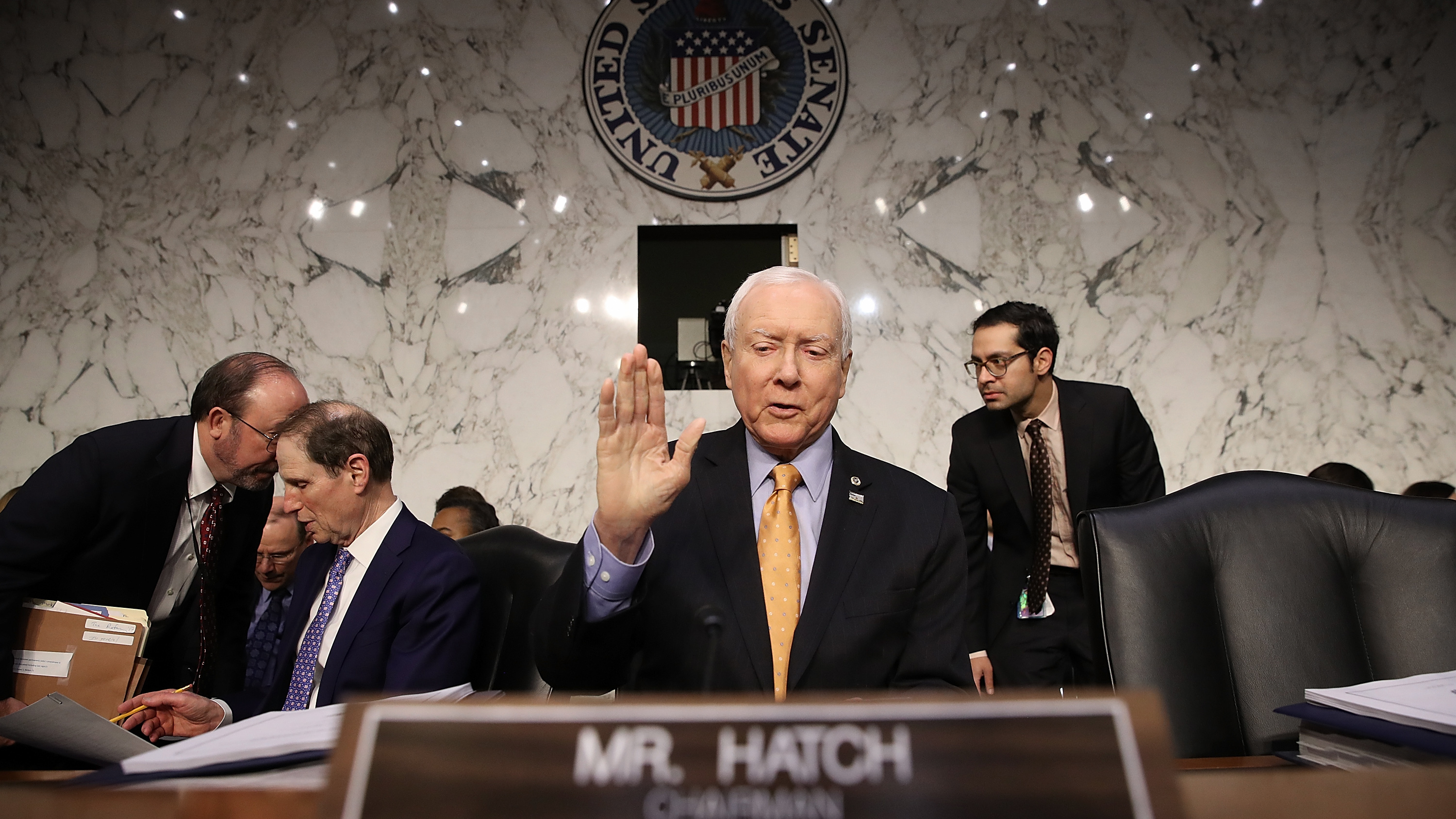 Senate Finance Committee chairman Orrin Hatch (R-Utah) gestures before a committee meeting on Nov. 15 in Washington, D.C. (Getty Images)