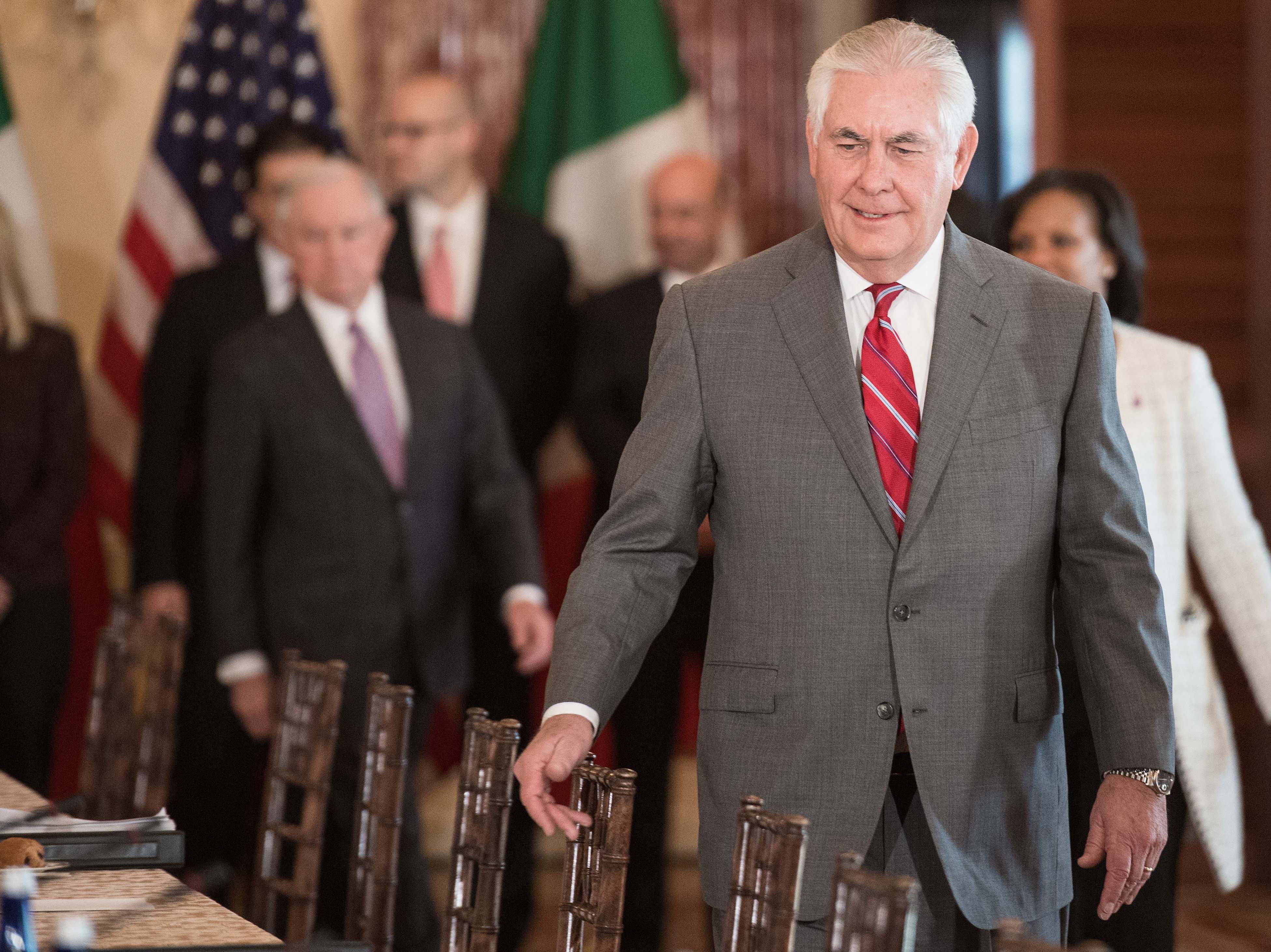 Secretary of State Rex Tillerson makes his way to his seat before the Strategic Dialogue on Disrupting Transnational Criminal Organizations at the State Department on Dec. 14. (AFP/Getty Images)