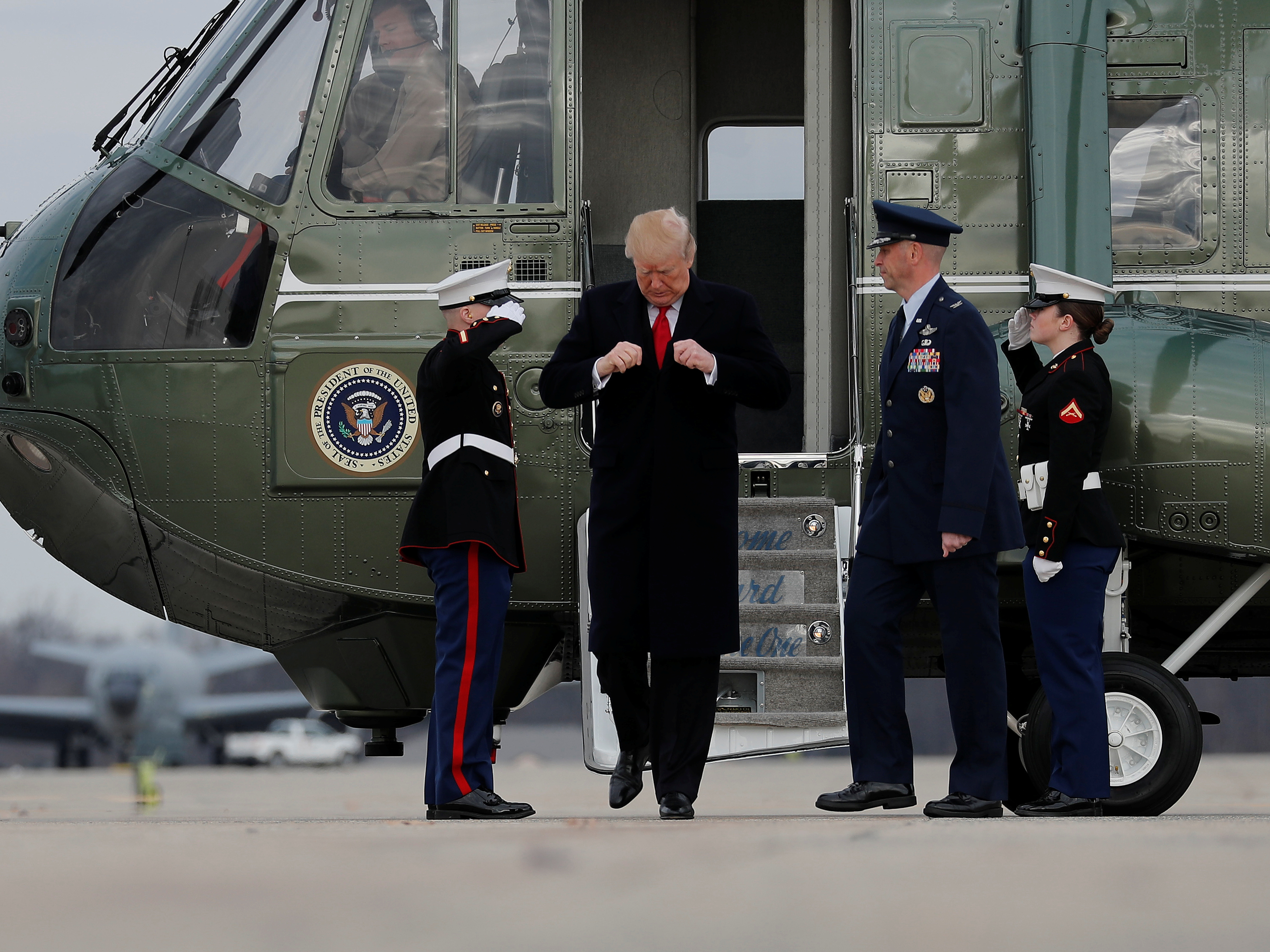 President Trump arrives to board Air Force One at Joint Base Andrews in Maryland on Dec. 22. Openly transgender people will be allowed to enlist in the military starting Monday after the White House decided not to appeal. (Reuters)