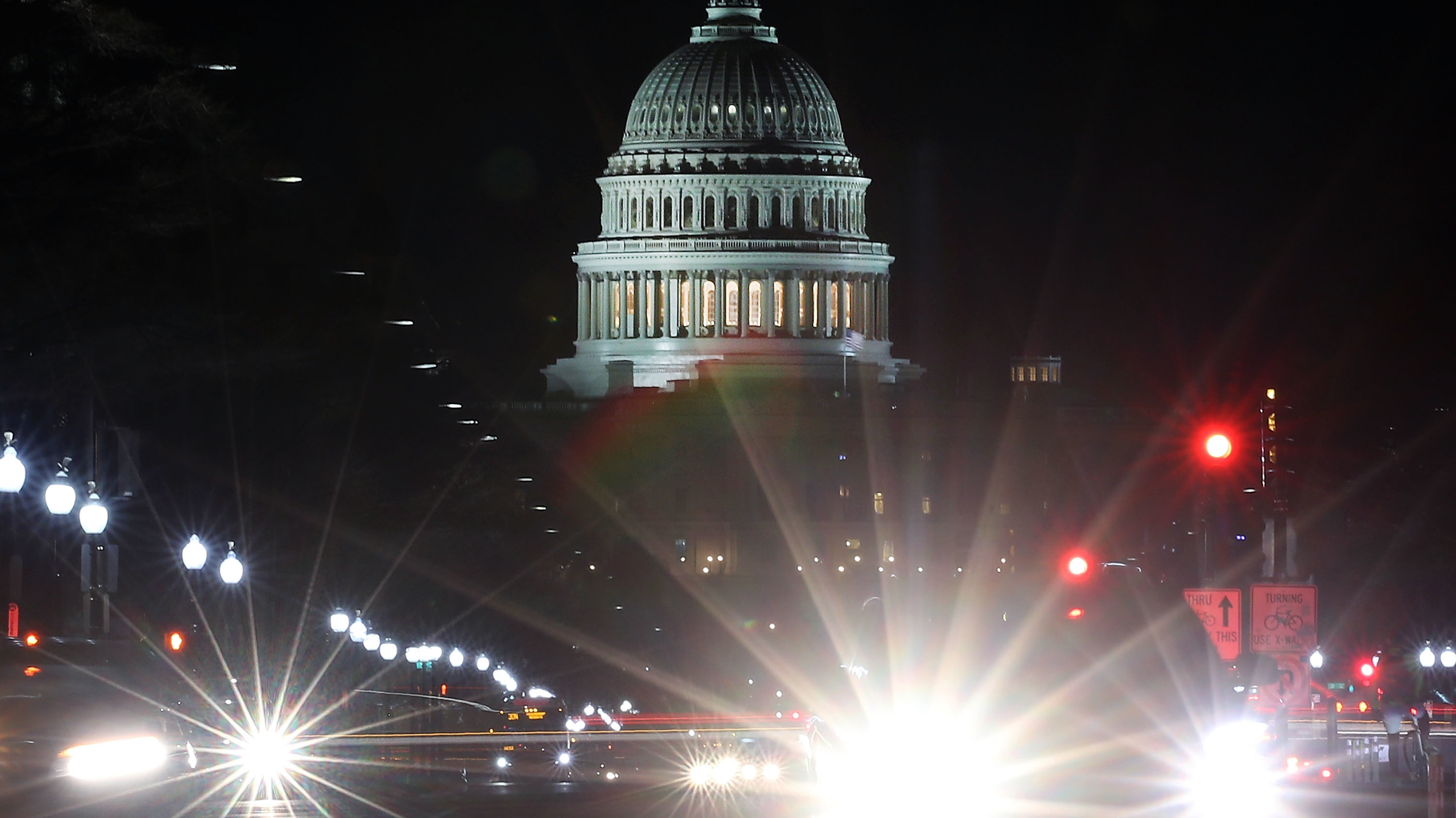 Traffic streaks past the U.S. Capitol last month in Washington, D.C. (Getty Images)