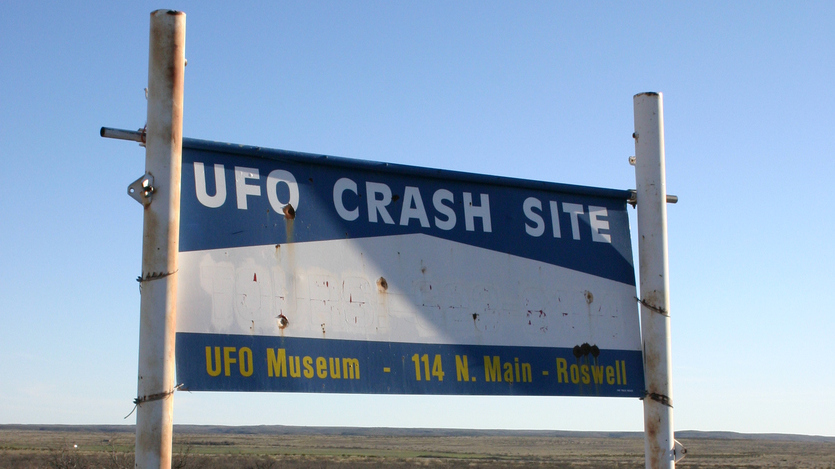 A sign marks the path leading to a supposed UFO crash site outside Roswell, N.M.