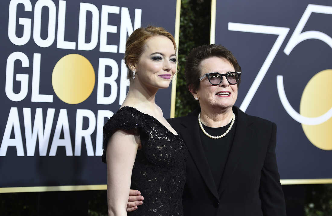 Emma Stone, left, and Billie Jean KIng arrive at the 75th annual Golden Globe Awards .