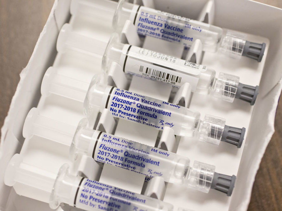 As flu cases mount in California, the state's health department recommends vaccination for all people 6 months and older. (Bloomberg via Getty Images)